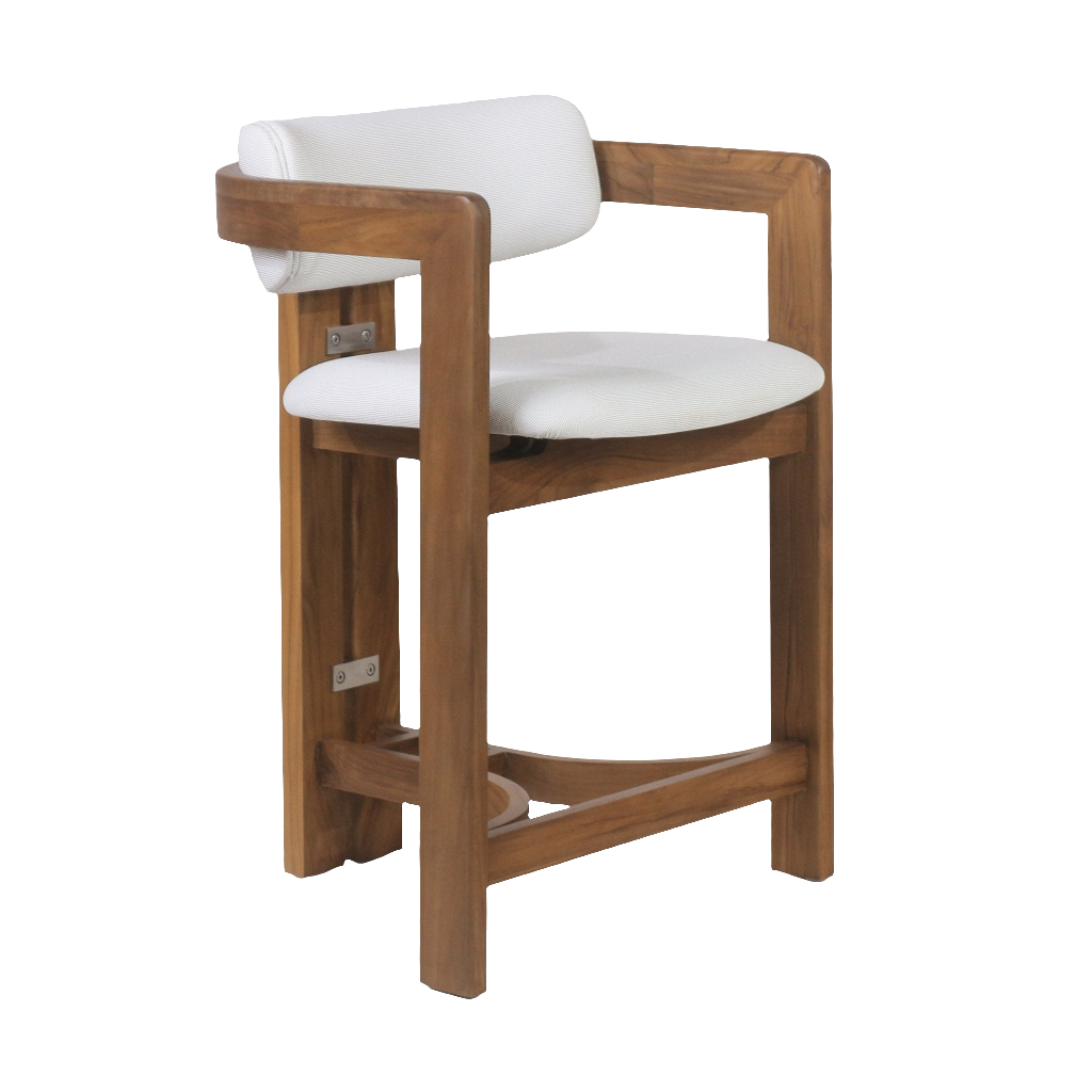 Teak-framed outdoor bar stool with a white fabric upholstered seat and curved back cushion, squared teak armrests and integrated footrest showing warm natural wood grain in a contemporary coastal style.