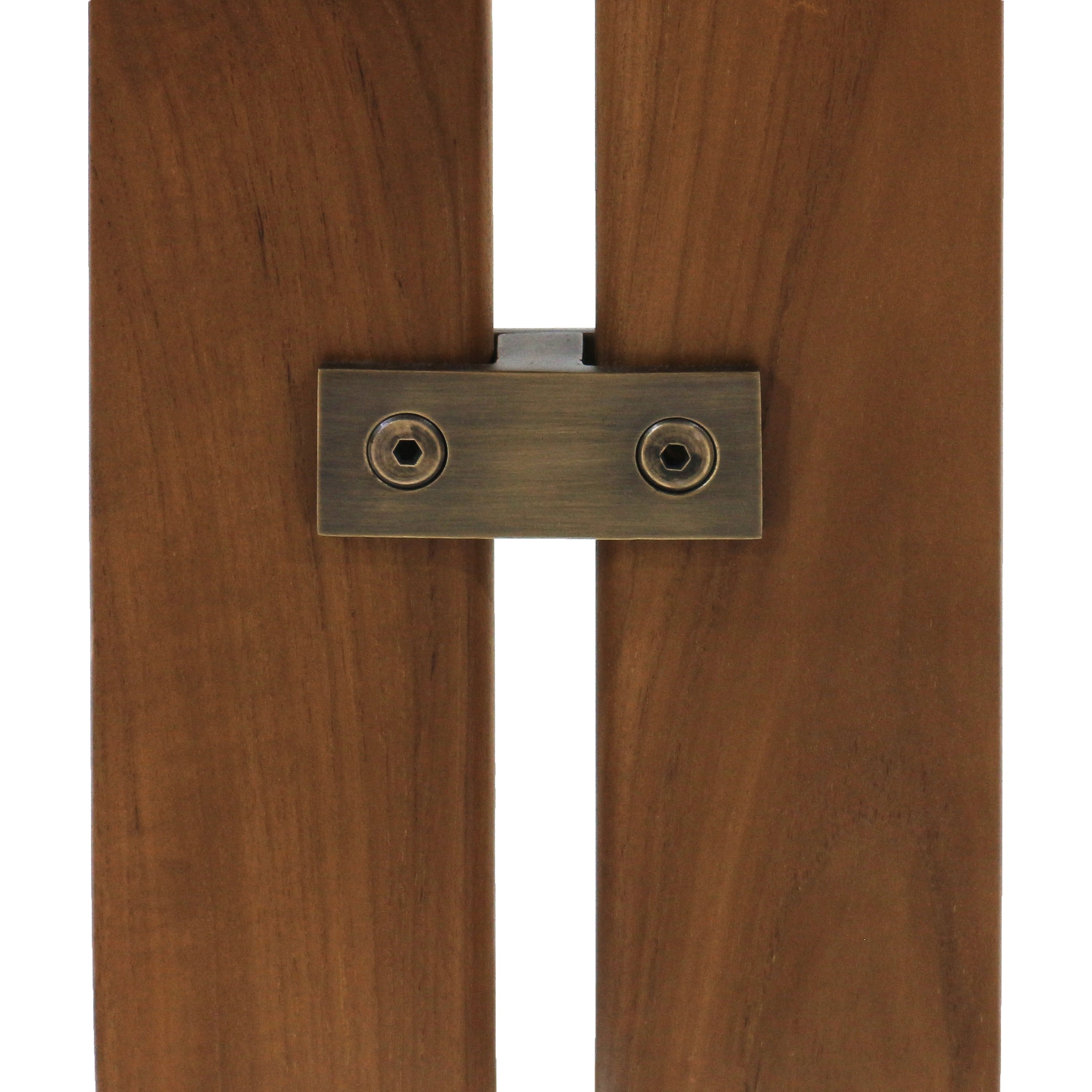 Close-up of two warm walnut wood slats joined by a rectangular antique-brass hardware plate with two hex-head screws, highlighting the wood grain and metal connector detail.