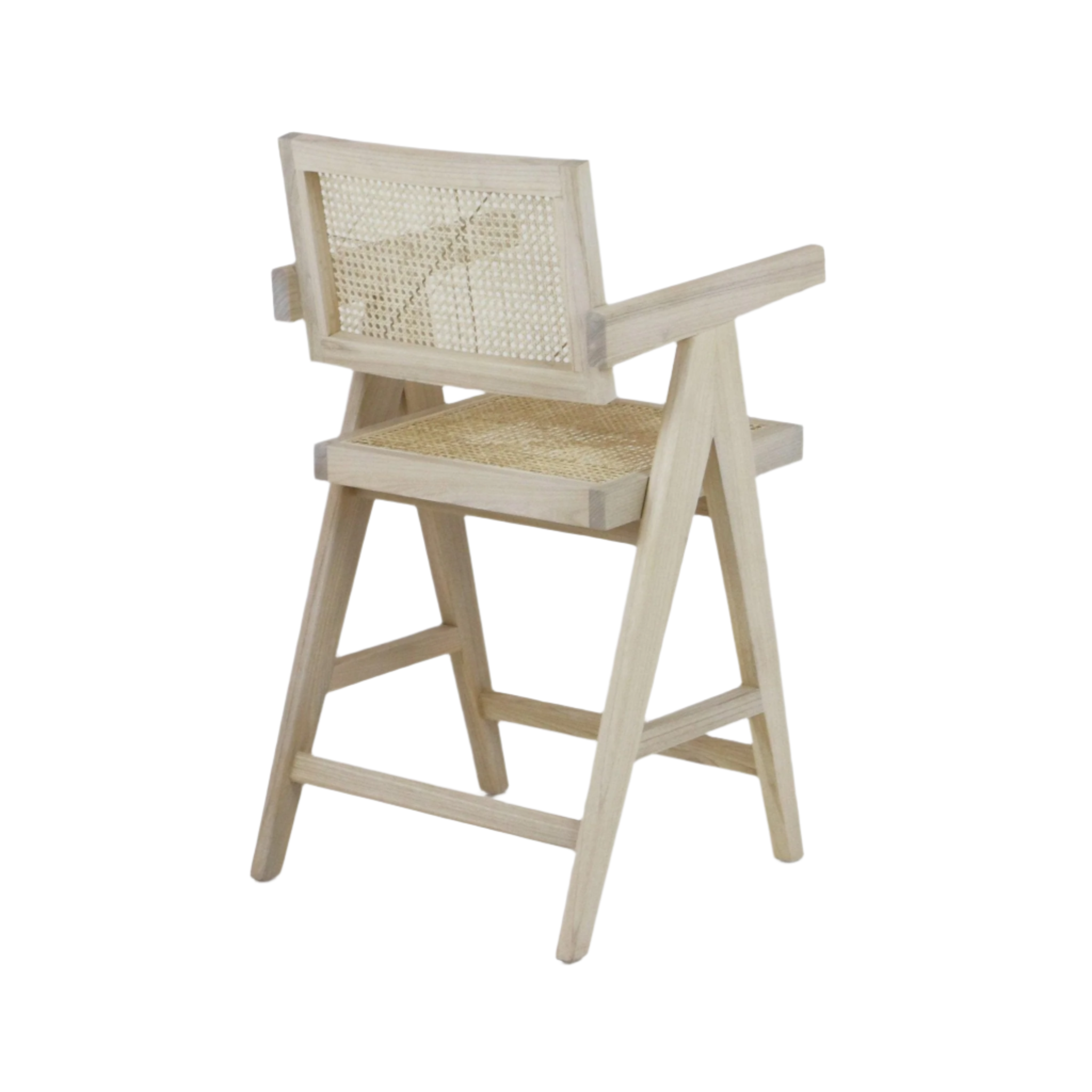 Natural wood counter stool with woven rattan seat and cane back, angled A-frame legs and short armrests in a mid-century modern style.