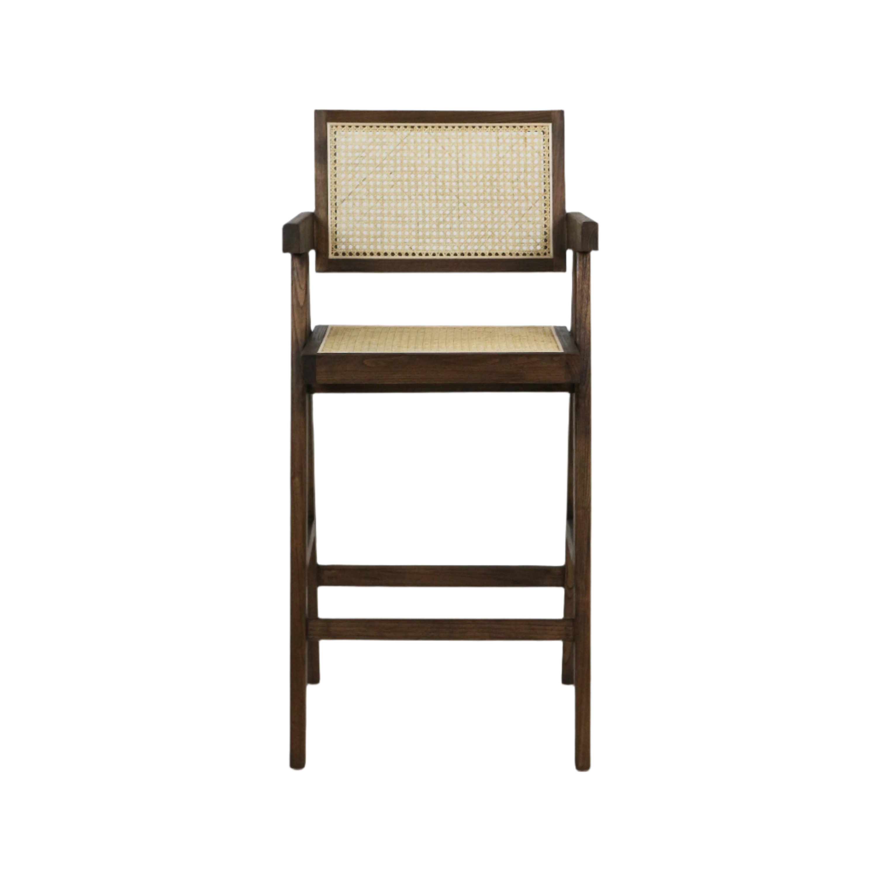 Front view of a natural rattan (cane) seat and back bar stool with a dark natural wood frame, squared armrests, straight legs and a built-in footrest in a mid-century modern style.