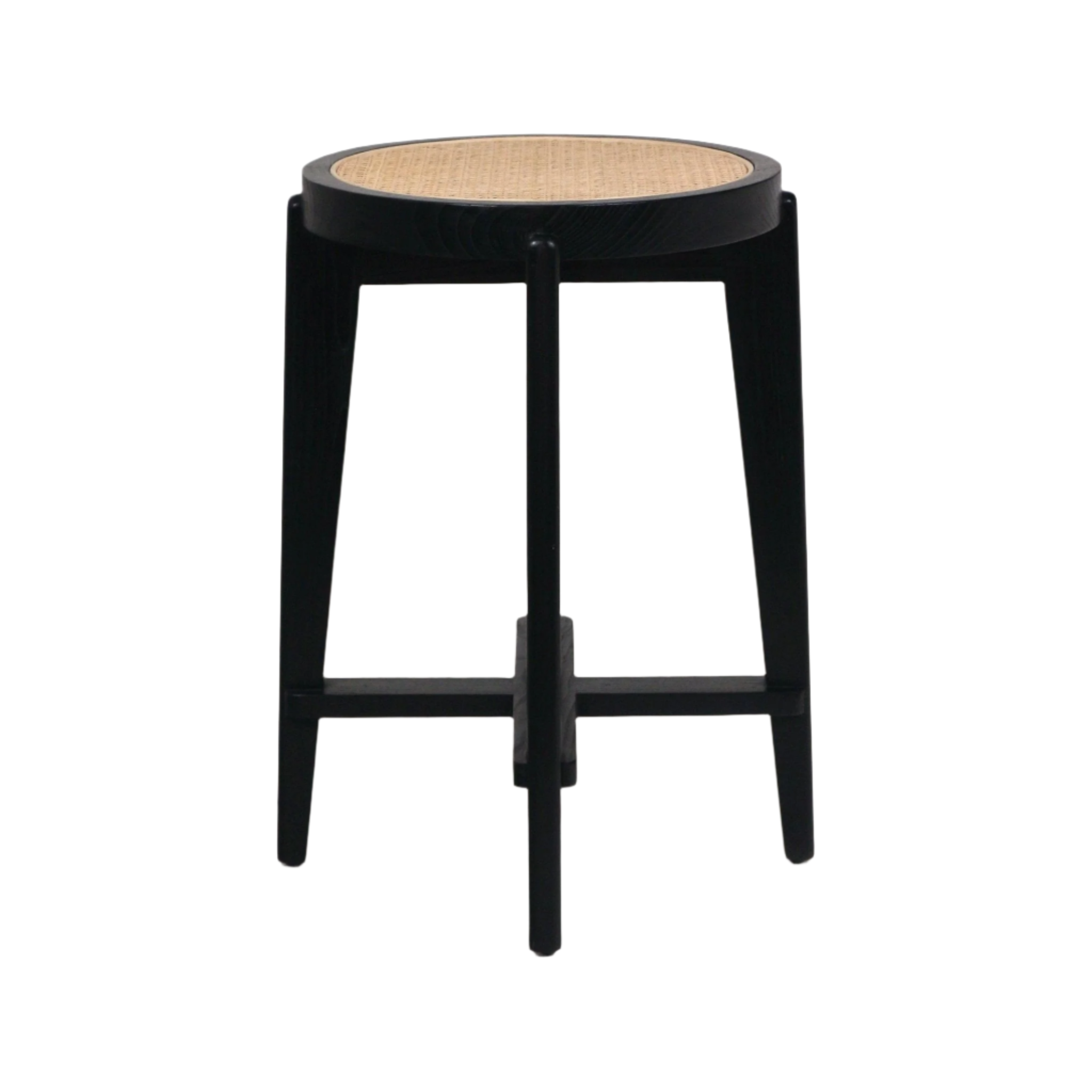 Front view of a round counter stool with a natural rattan cane seat inset in a black wooden frame, four tapered legs and a crossbar footrest in a modern, backless design.