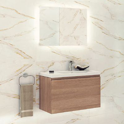Modern wall-mounted floating solid wood vanity with a white stone top and rectangular single sink, chrome single-hole faucet, illuminated mirrored cabinet above, and towel ring beside it against a cream marble-veined wall.