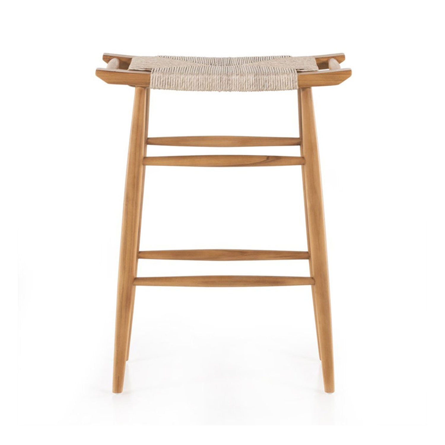 Backless teak outdoor bar stool with natural woven seat, tapered legs and two horizontal foot rails in a coastal Scandinavian style, shown on a white background.