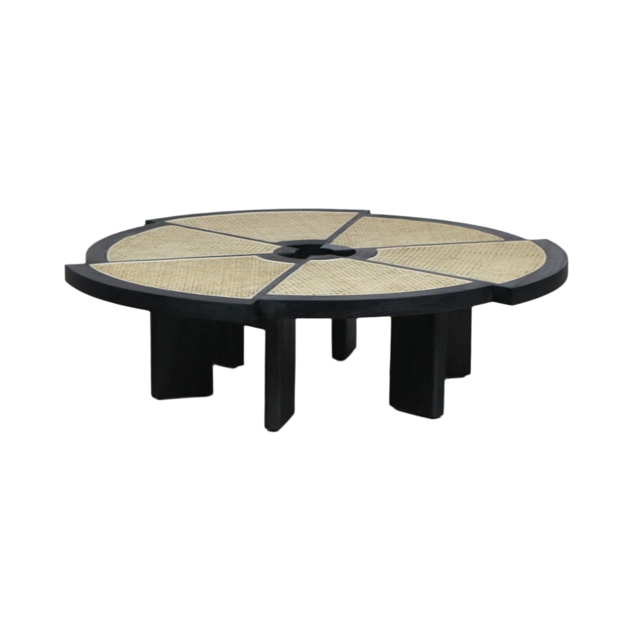 Low round coffee table with a black solid wood frame and six natural cane wedge insets on the tabletop, supported by multiple chunky black legs for a modern, mid-century-inspired living room centerpiece.