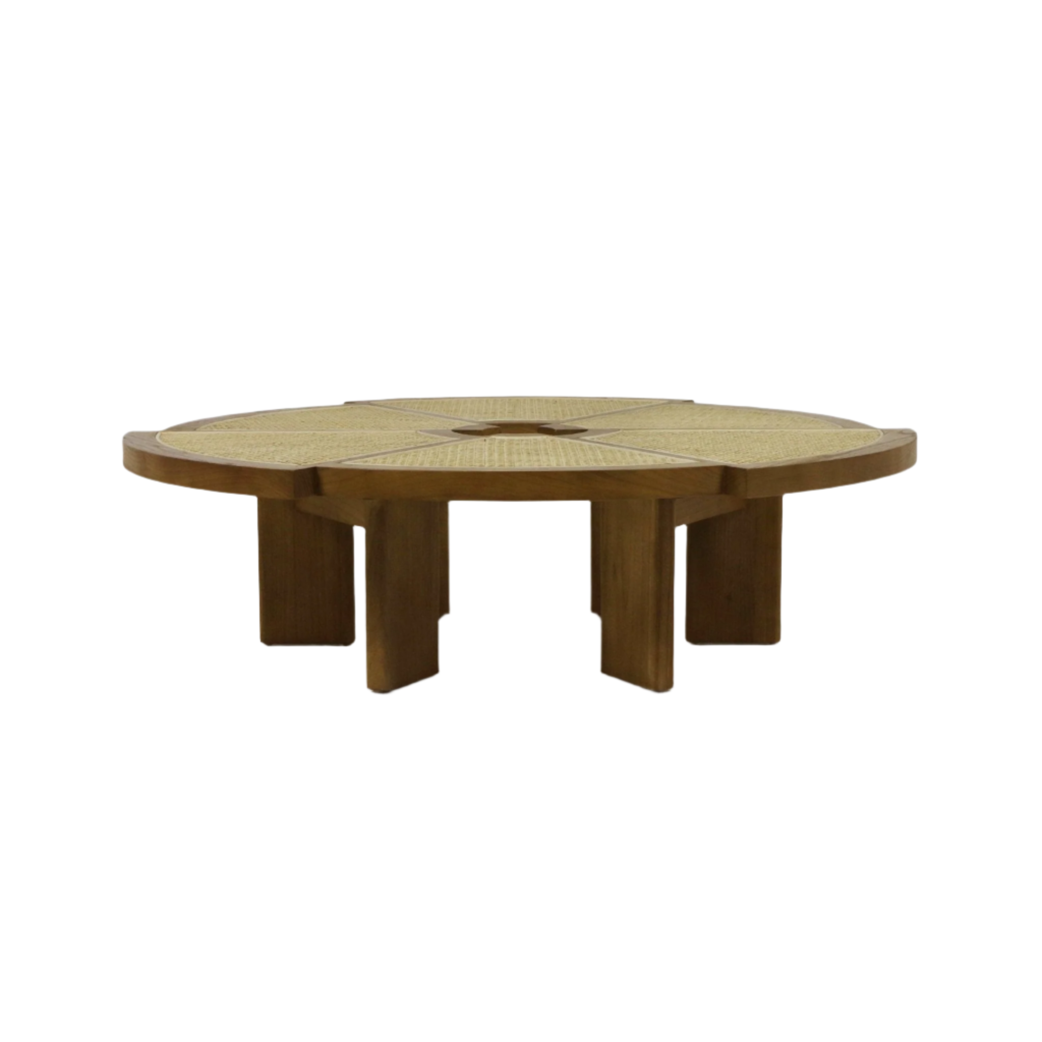 Low round coffee table in natural solid wood with a woven cane inset top divided into radial panels and a small center opening, supported by chunky rectangular legs in a warm teak-brown finish.
