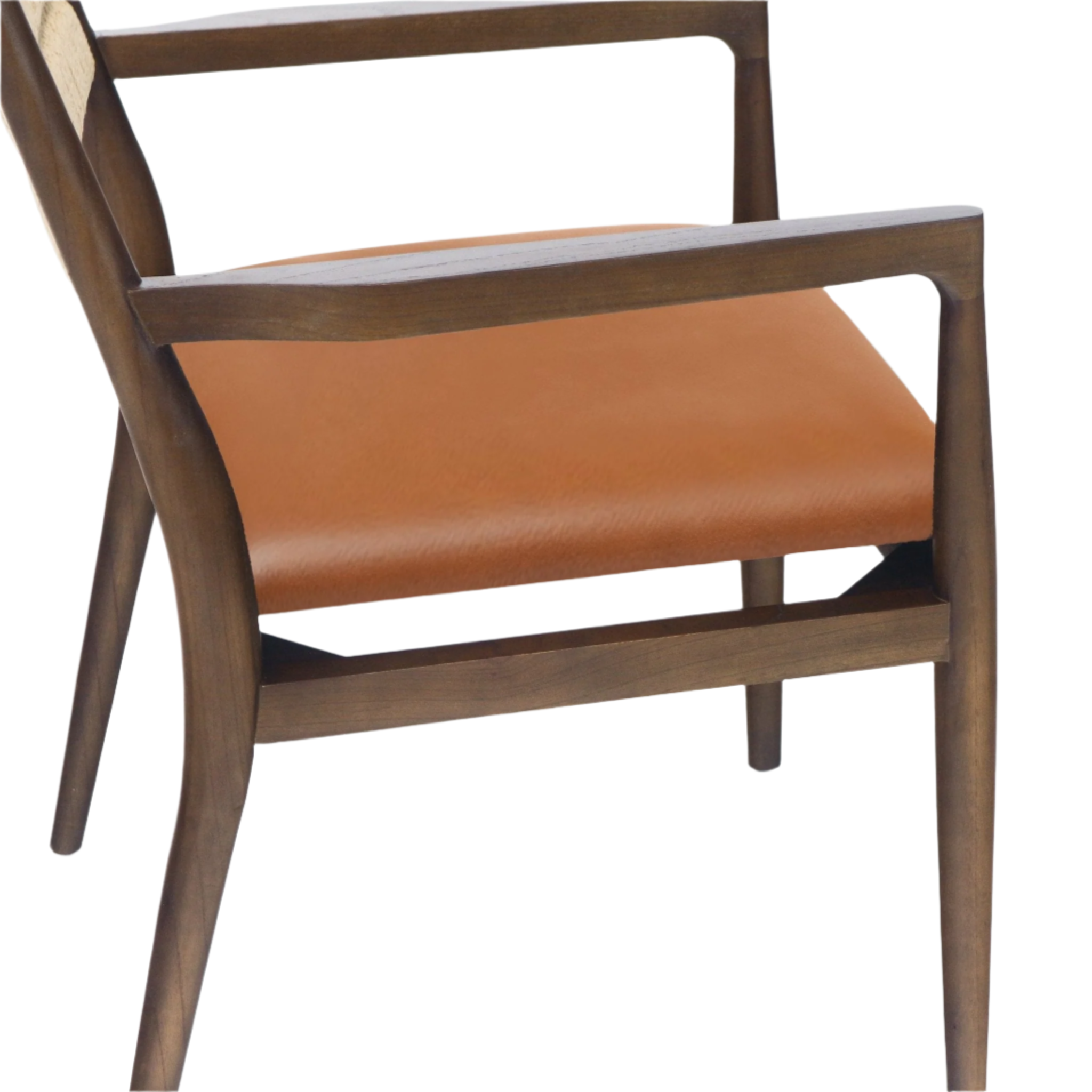 Close-up of a tan leather dining chair seat with contoured natural wood armrest and tapered legs, showing smooth upholstery and a glimpse of the woven rope backrest.