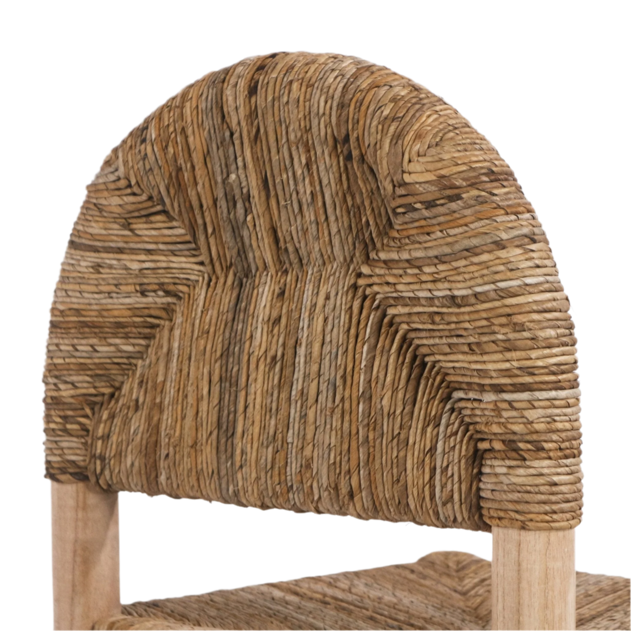 Close-up of the counter stool's arched backrest woven from natural seagrass in warm teak tones, highlighting the textured braided pattern and a portion of the light teak wood frame and seat edge.