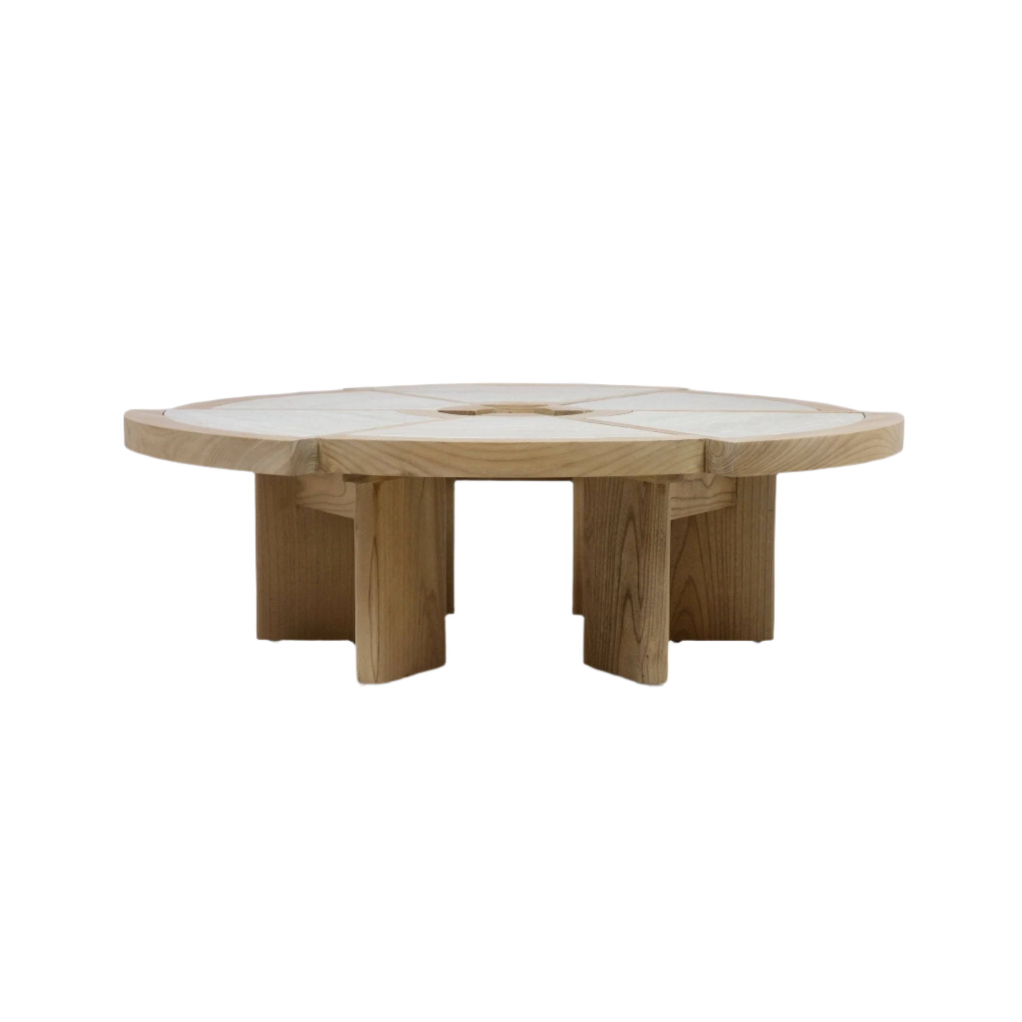 Low round coffee table in solid oak with a segmented natural travertine inset top and chunky curved pedestal legs in a light oak finish, modern contemporary design.