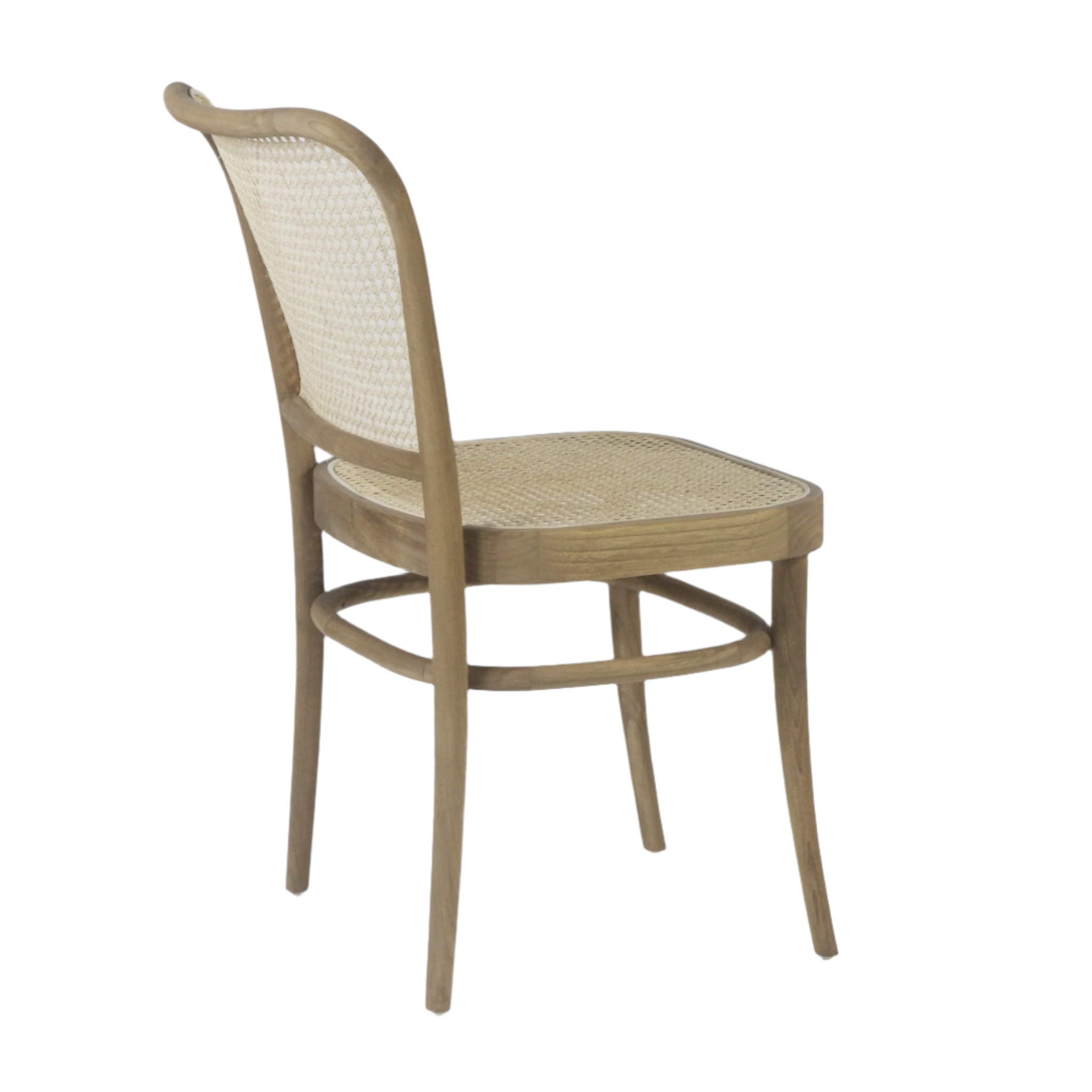 Rear three-quarter view of an armless oak dining chair with woven cane seat and cane back, natural oak finish and curved frame with rounded stretcher supports in a coastal style on a white background.