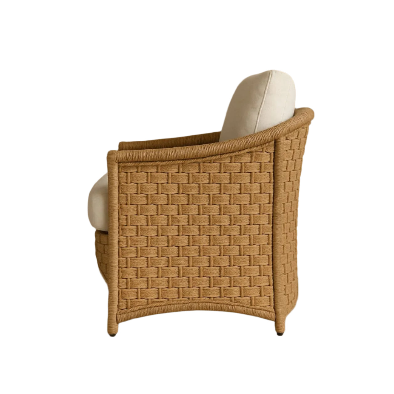 Side profile of a boho-style all-weather rattan and synthetic woven accent chair in natural tan with a cream cushioned seat and back.