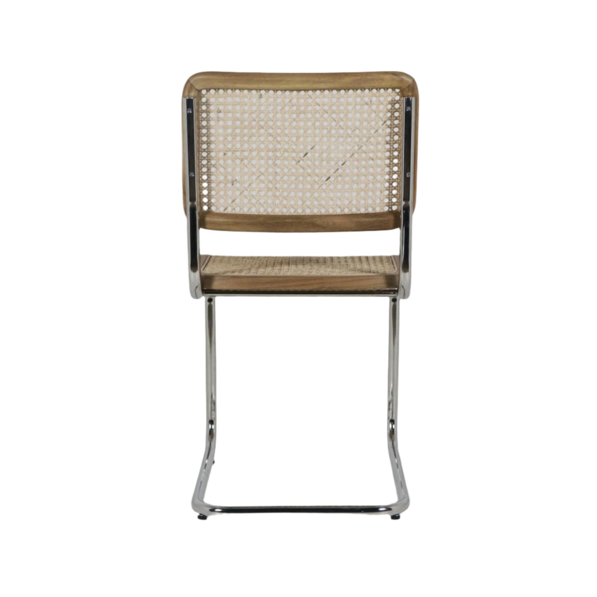 Rear view of a teak and rattan dining chair with woven cane back and seat, teak wood frame accents and polished aluminium cantilever legs in a mid-century modern boho style.