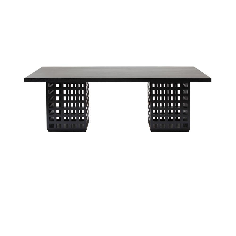 Rectangular black mahogany solid wood dining table with a thin flat top and two square lattice-grid pedestal bases in a modern contemporary minimalist style.