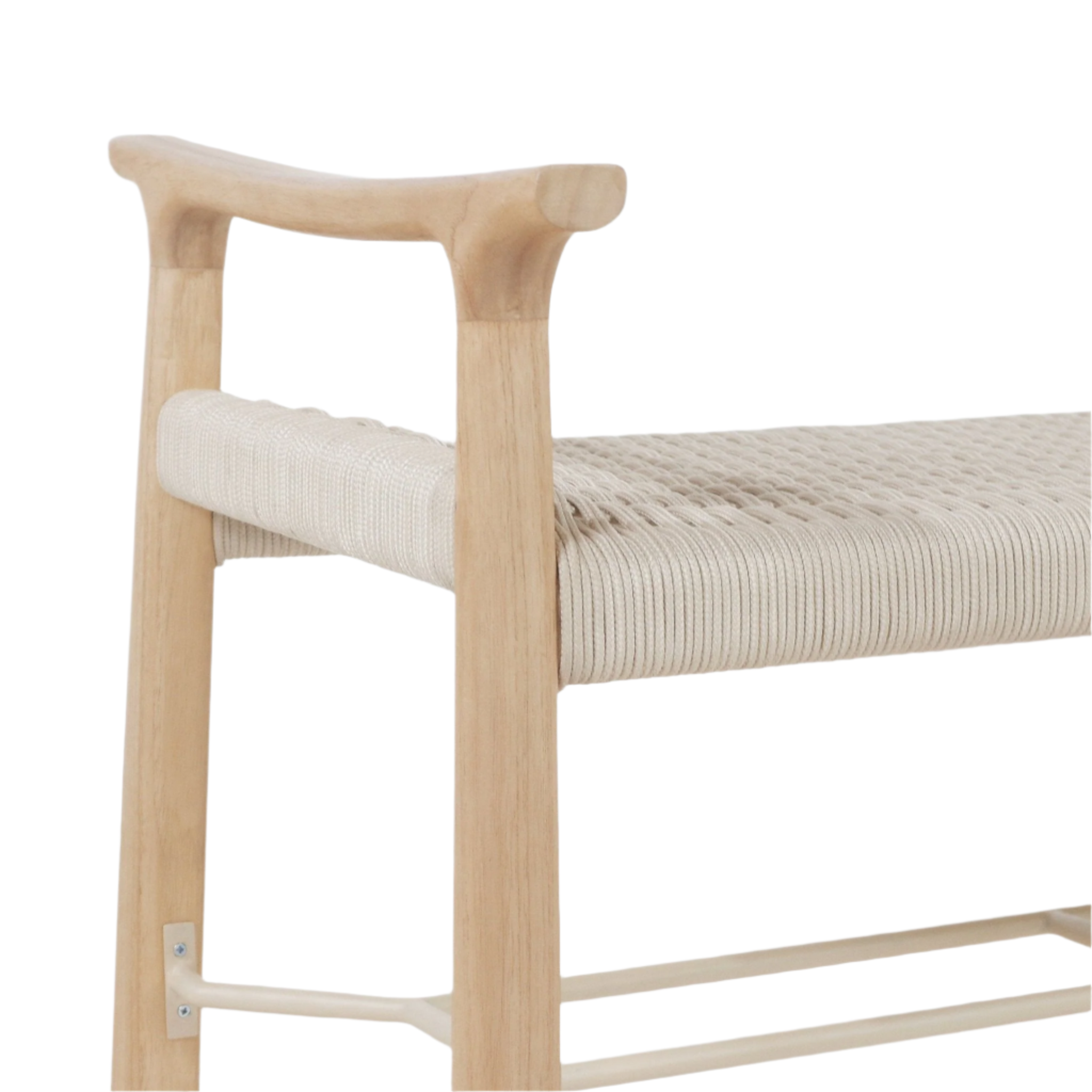 Close-up of a modern entryway bench corner showing a curved natural wood arm and leg, beige woven rope seat, and light metal footrest stretcher.