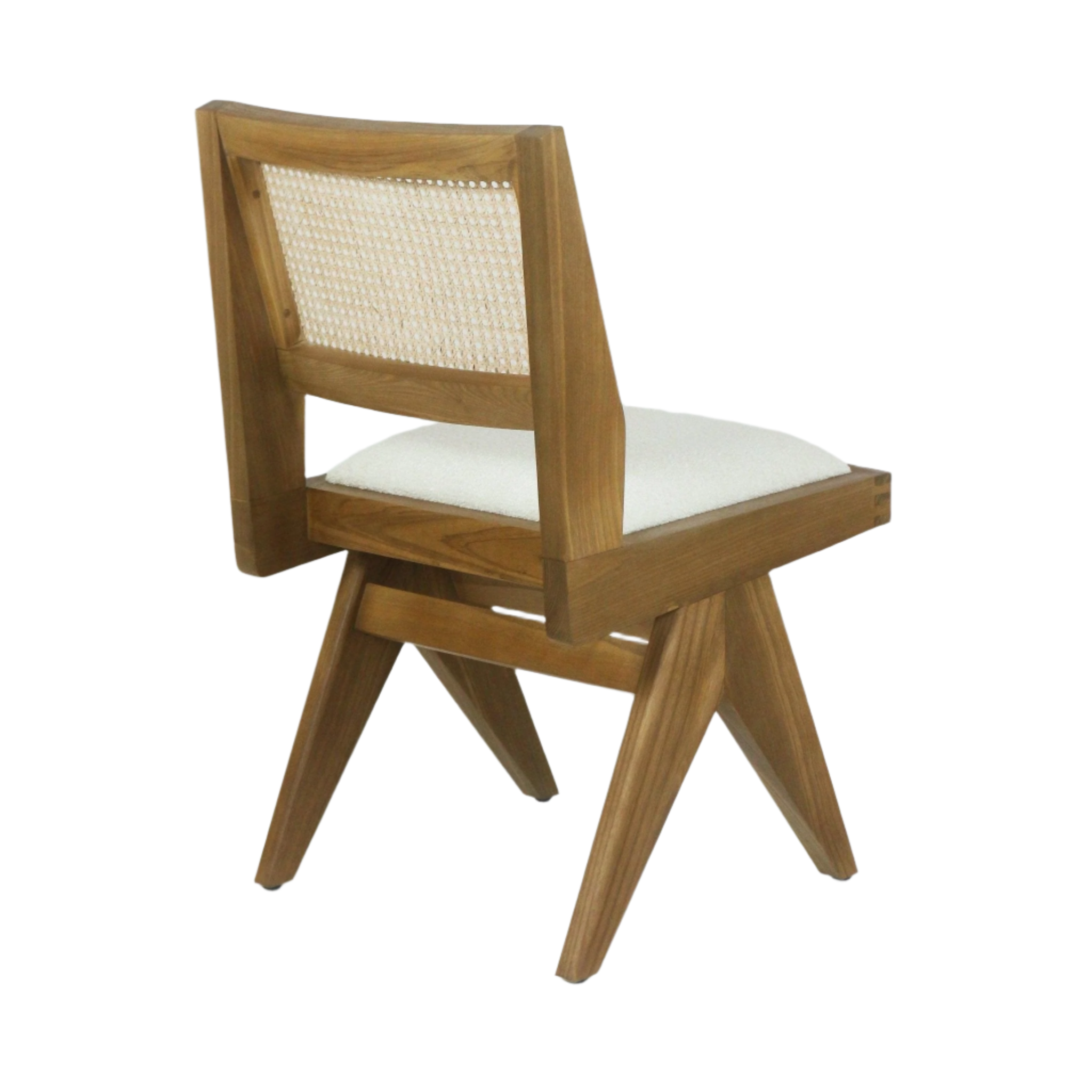 Armless solid ash dining chair with a woven cane backrest and cream boucle upholstered seat, featuring angled mid-century modern legs and a natural wood finish.