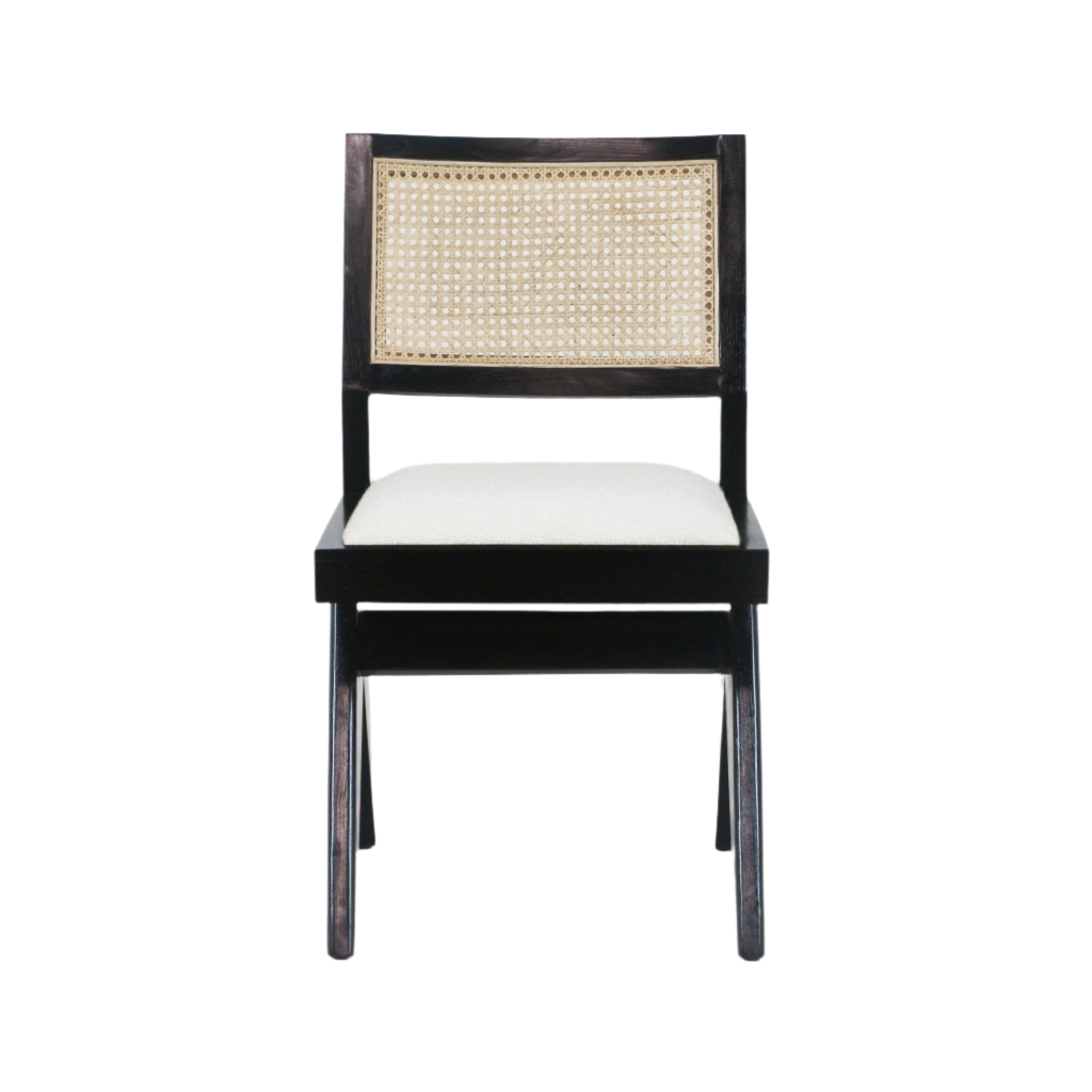 Front view of an armless side chair with a black solid wood frame, woven natural cane back panel and a cream upholstered boucle seat cushion on a white background.