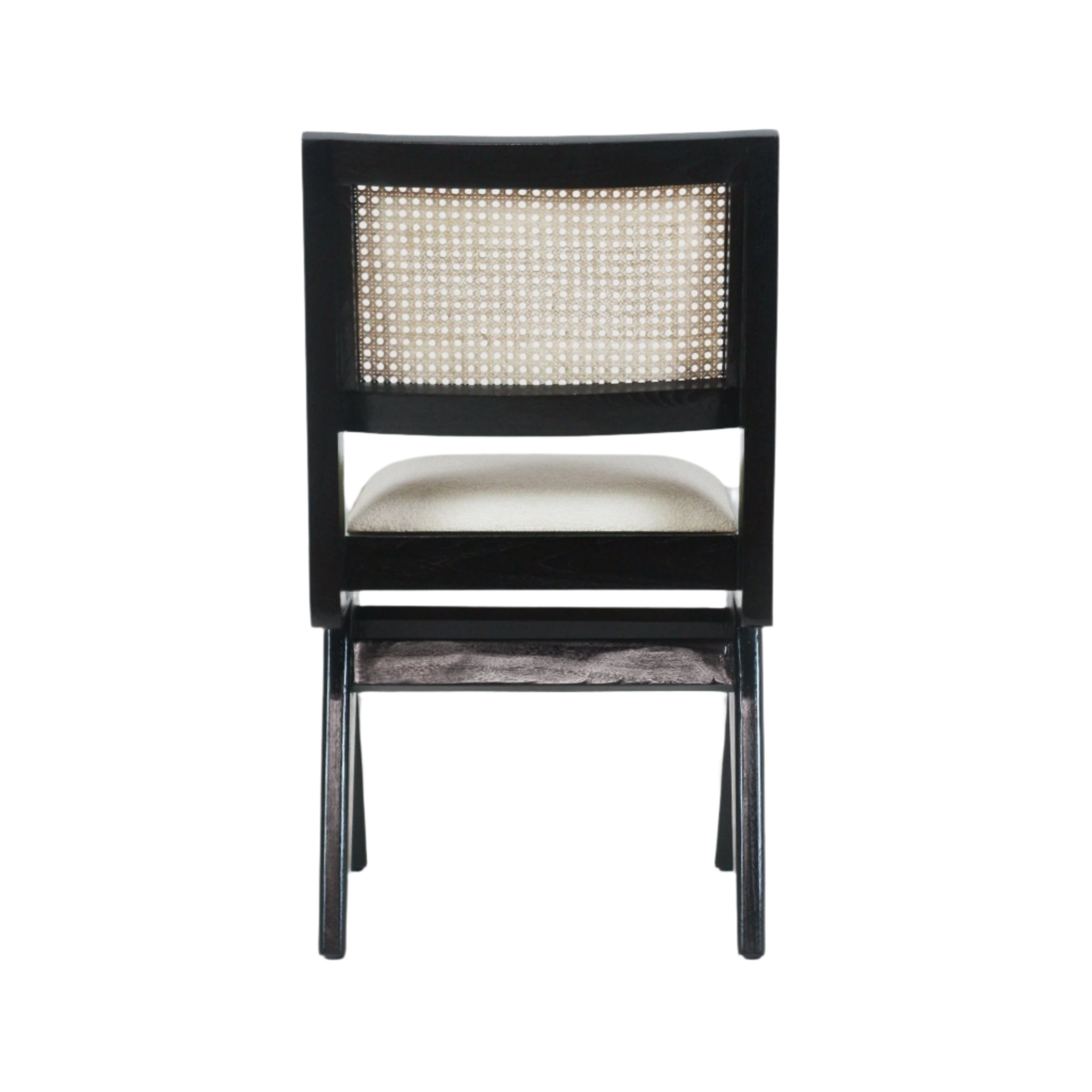Rear view of an armless dining side chair with a black solid wood frame, woven natural cane backrest and a cream upholstered seat on a white background.