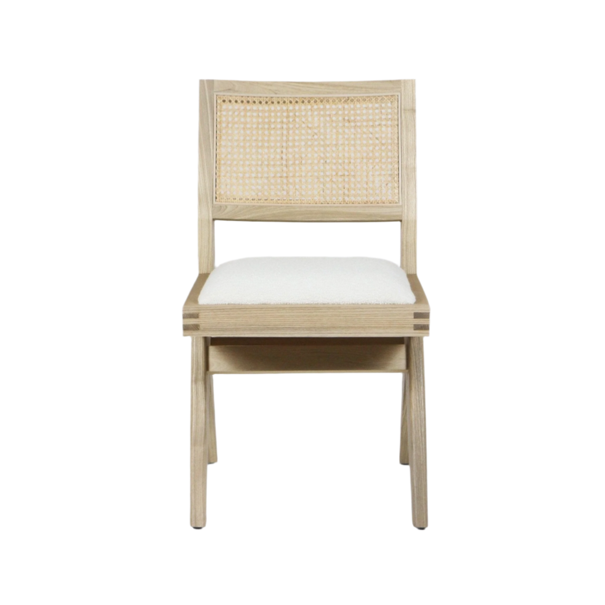 Front view of an armless dining chair with a natural ash wood frame, woven cane backrest and a cream boucle upholstered seat cushion against a white background.