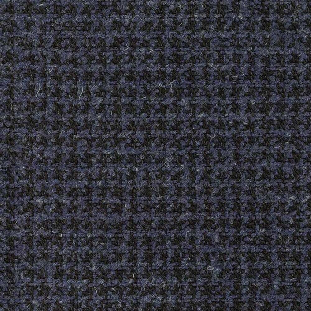 Close-up of dark navy and charcoal tweed upholstery fabric showing a small woven check texture and soft wool-blend pile (10% wool, 45% acrylic, 5% linen, 40% polyester) for sofa use.