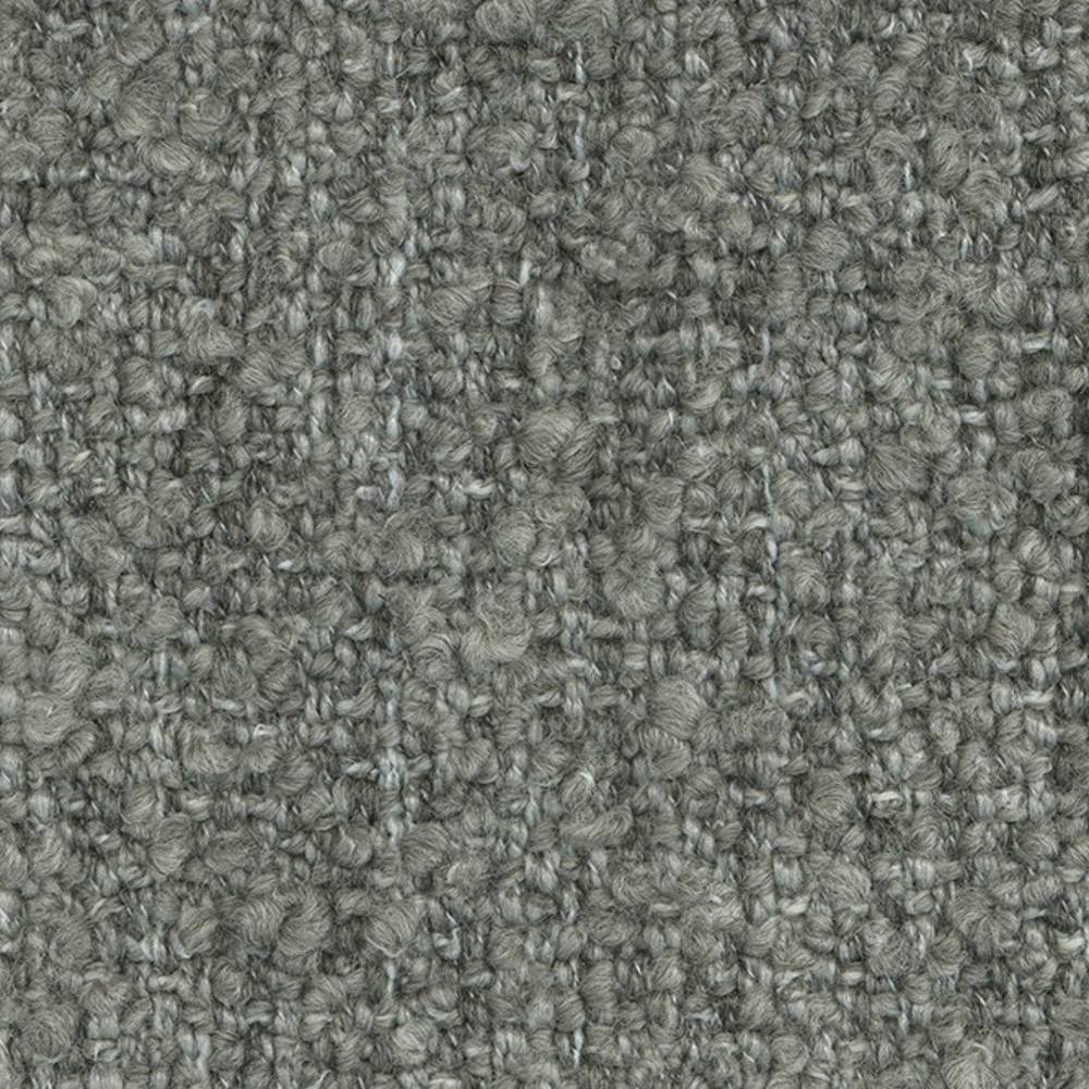 Close-up of gray bouclé upholstery fabric showing looped wool-acrylic-polyester blend yarns (24% wool, 66% acrylic, 10% polyester) with a soft, textured woven surface suited for contemporary sofas.