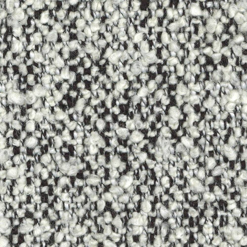 Close-up of off-white boucle wool-blend upholstery fabric with looped texture and dark-gray flecks, showing the woven construction ideal for contemporary sofa upholstery.