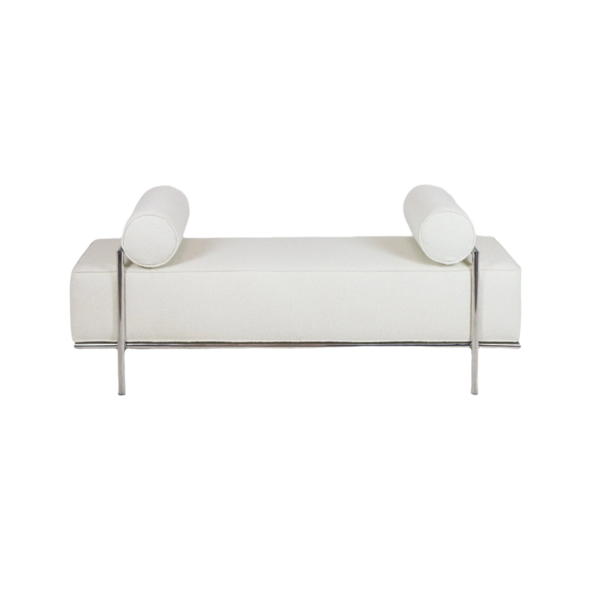 White boucle upholstered end-of-bed bench with two cylindrical bolster pillows supported by polished stainless-steel posts and a slim metal frame in a modern minimalist style.