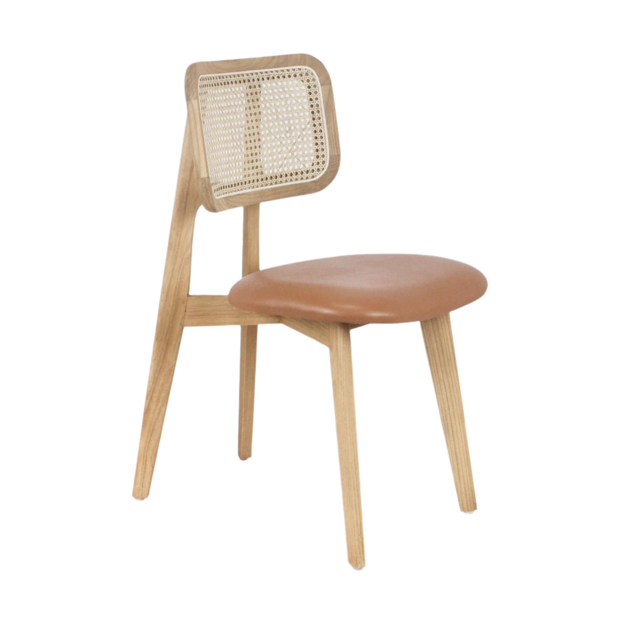 Armless dining chair with a natural wood frame, woven rattan rectangular backrest and a tan leather cushioned seat, featuring tapered wood legs and a minimalist mid-century modern boho silhouette.