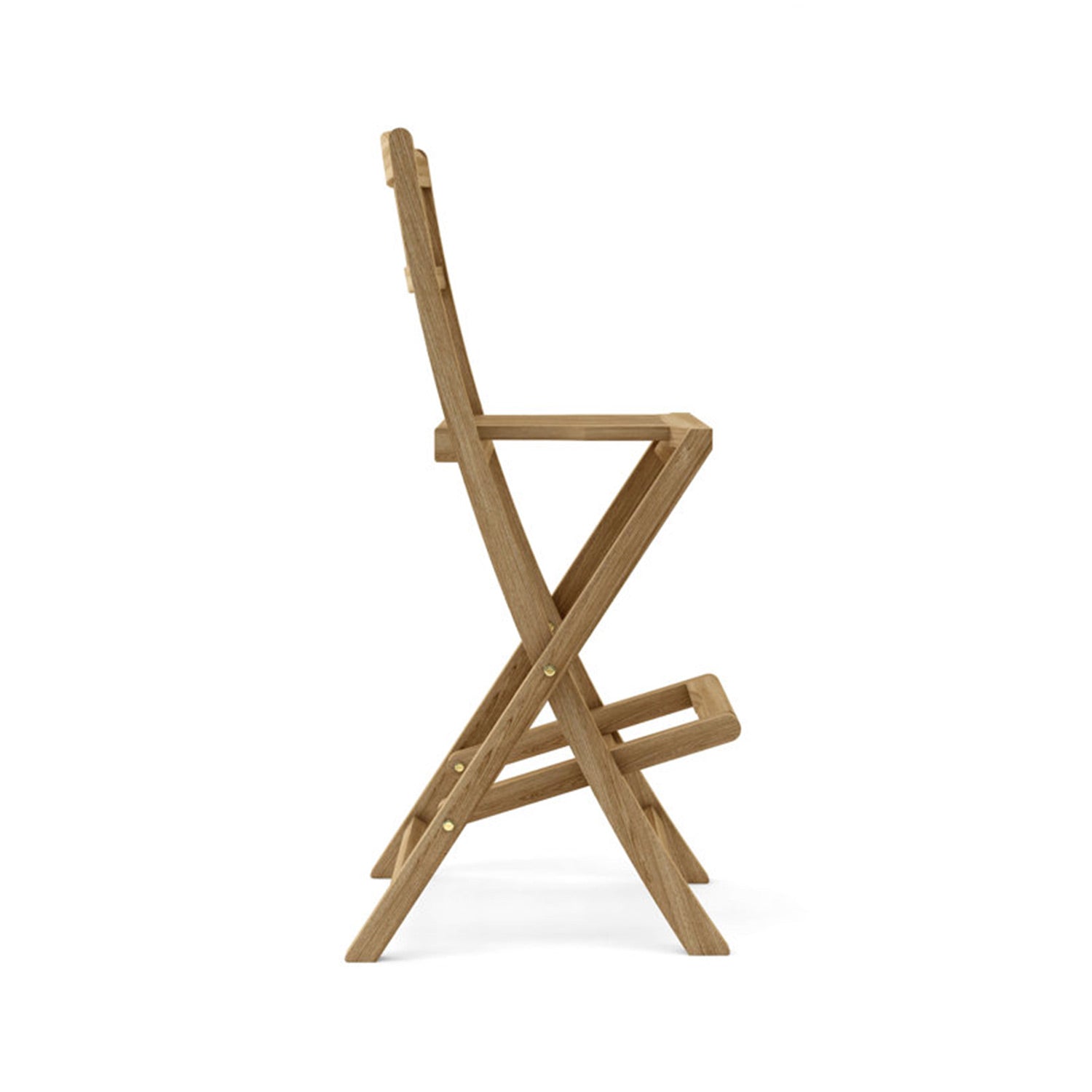 Side view of a folding armless teak outdoor bar stool in natural finish, solid wood frame with crossed X-leg design, integrated footrest and brass pivot hardware on a white background.
