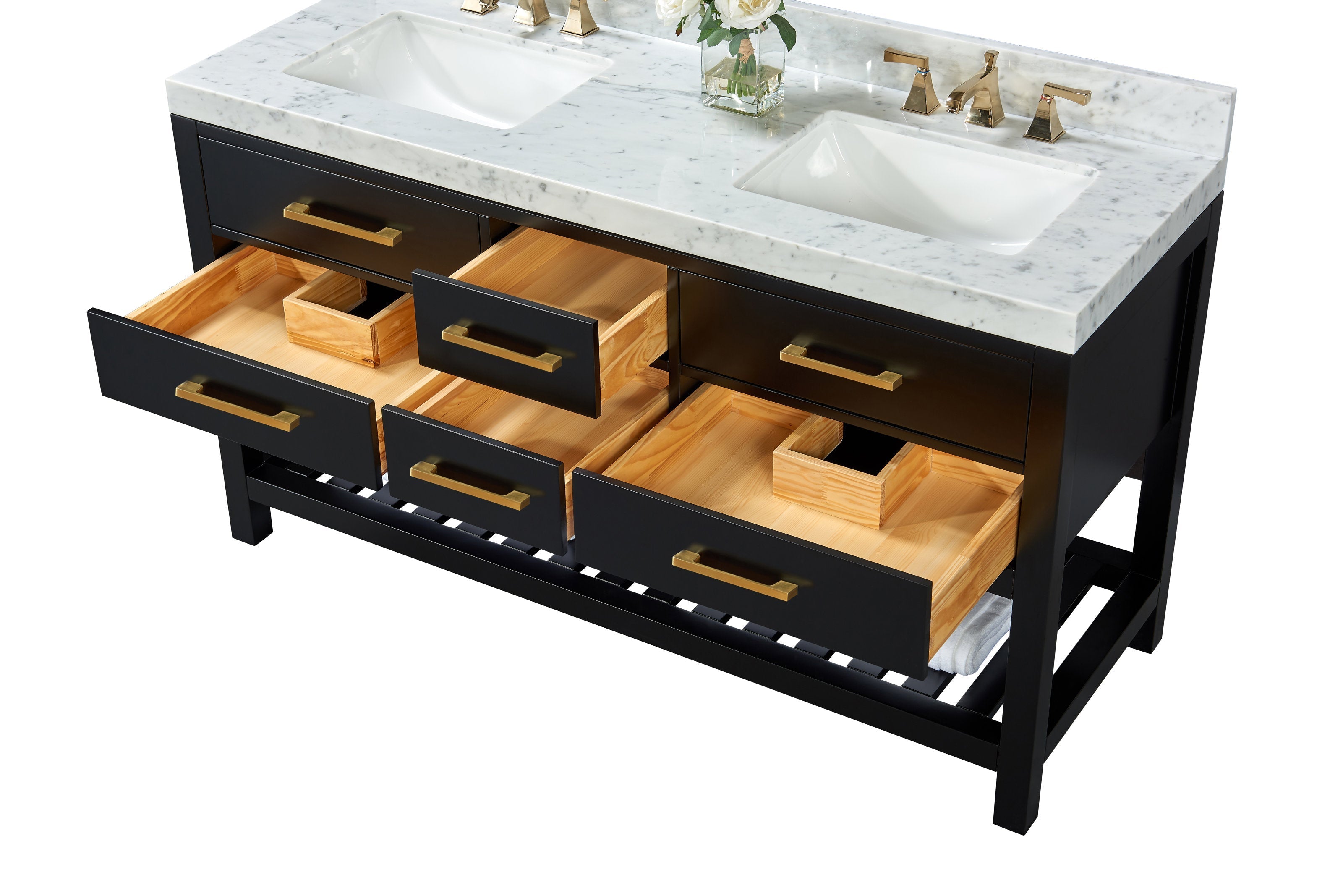 Black solid-wood bathroom vanity with white marble top, two rectangular ceramic sinks, brass faucets and matching brass drawer pulls, several open drawers showing natural wood interiors and a slatted lower shelf with towel.