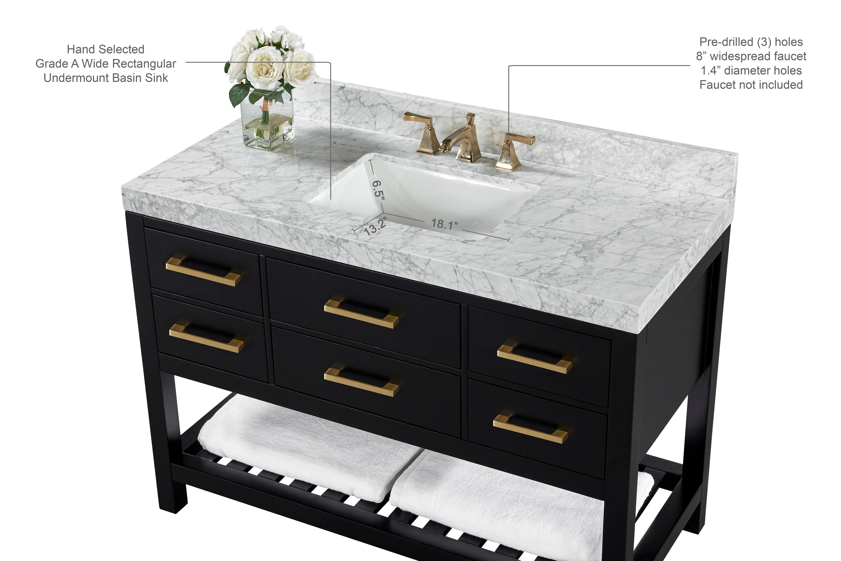 48-inch freestanding black solid-wood bathroom vanity with white marble stone top, rectangular undermount ceramic sink, brushed gold drawer handles and faucet, open slatted shelf with folded white towels and a vase of white roses.
