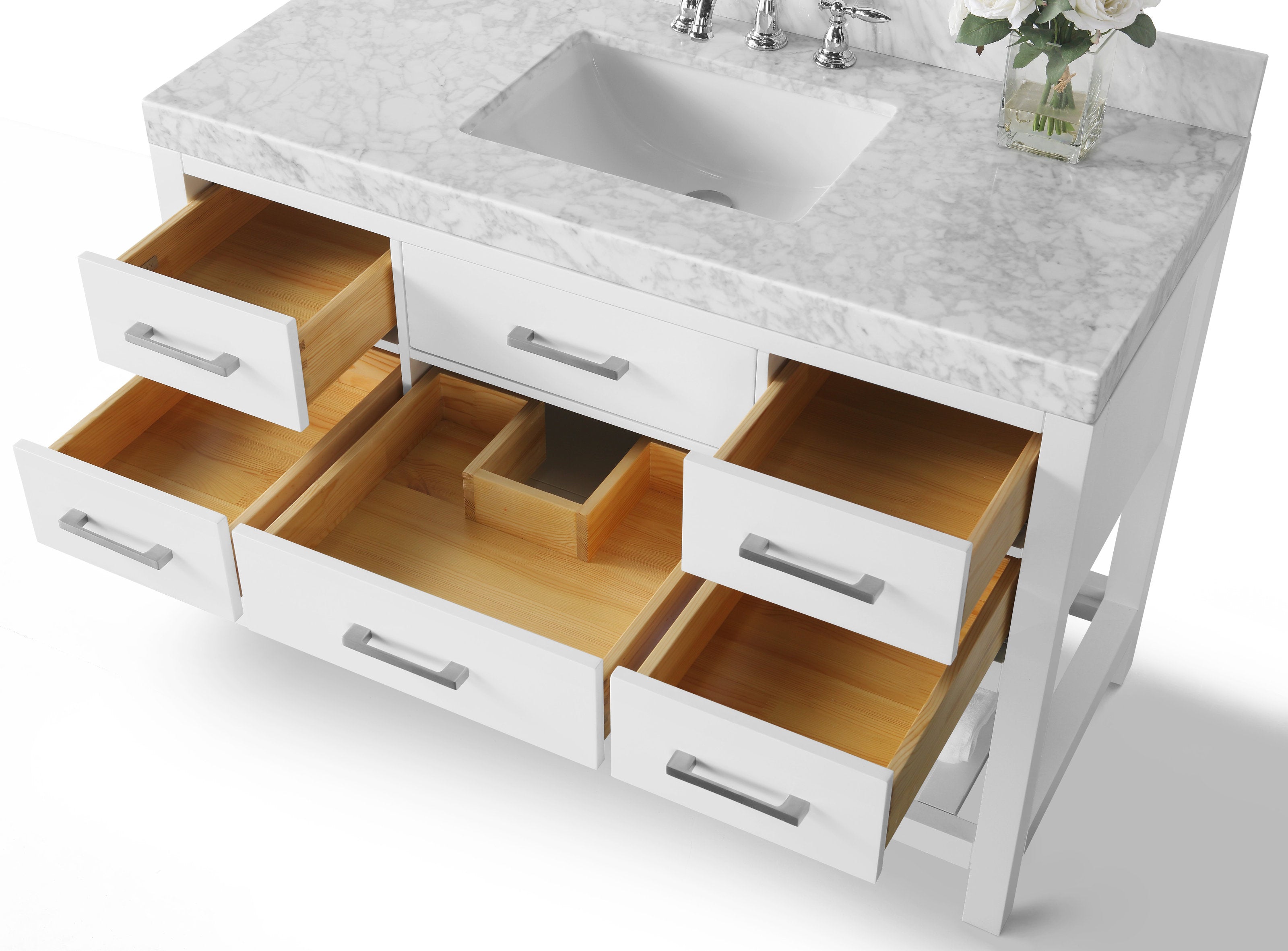White freestanding bathroom vanity with a stone marble countertop, rectangular undermount ceramic sink and chrome faucet; six open drawers reveal natural solid wood interiors and brushed metal handles for storage.