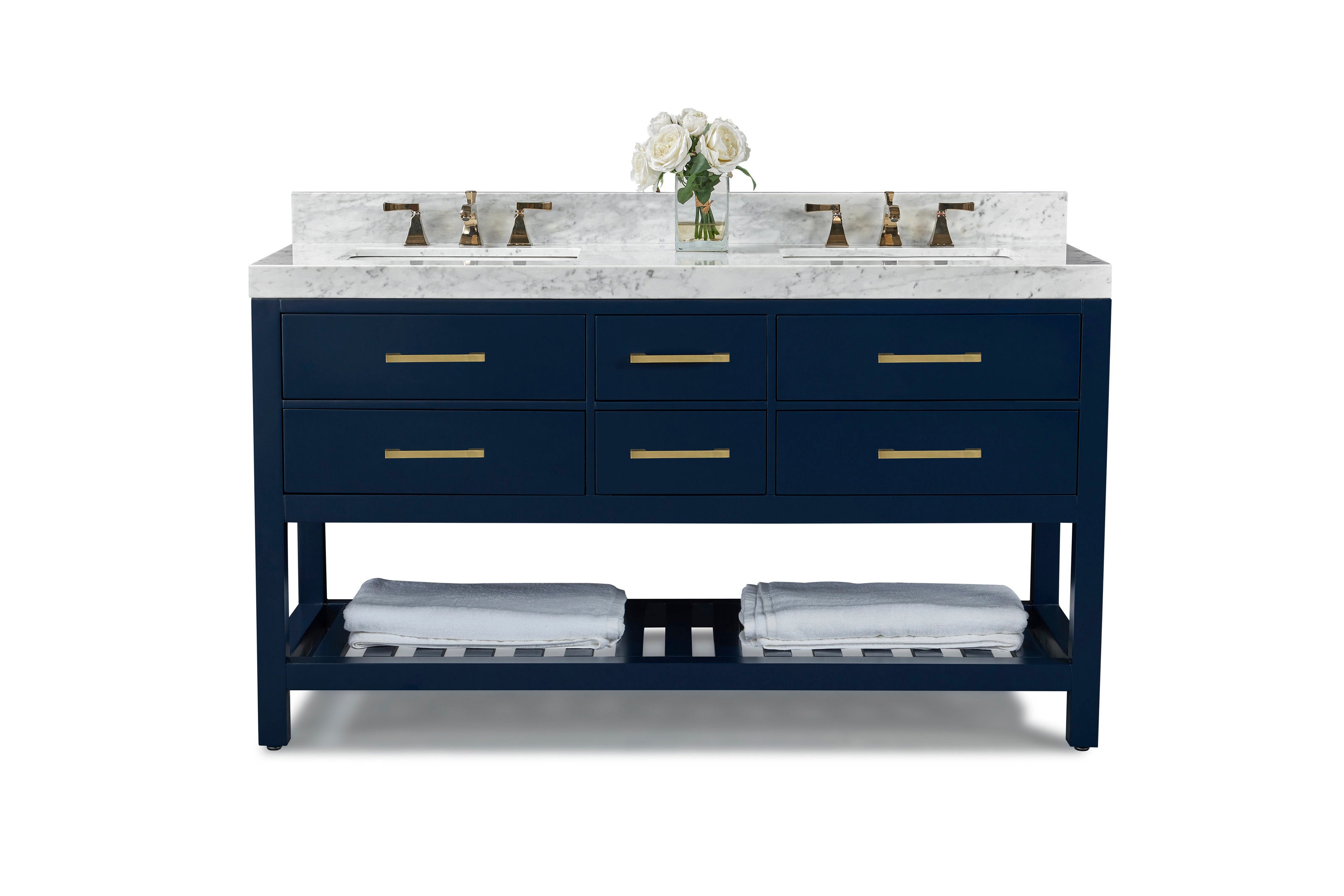 60-inch navy solid wood double-sink vanity with a stone marble top and backsplash, two undermount ceramic sinks, brushed gold faucets and drawer pulls, six drawers and an open slatted lower shelf with folded white towels and a small vase of white ros