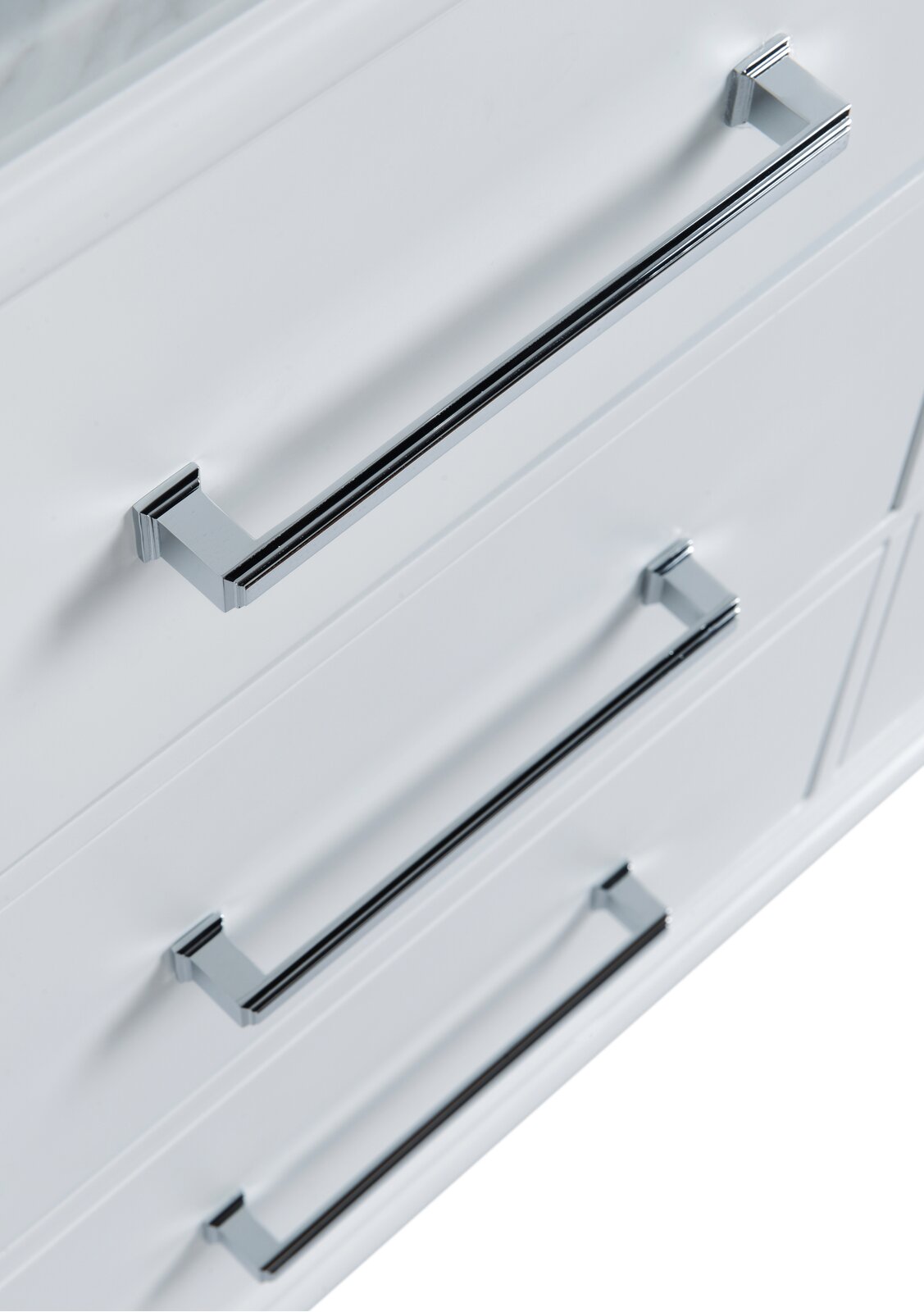 Close-up of three polished chrome bar drawer pulls mounted on stone-colored solid wood vanity drawers with recessed panel fronts, highlighting modern hardware and a smooth painted finish.