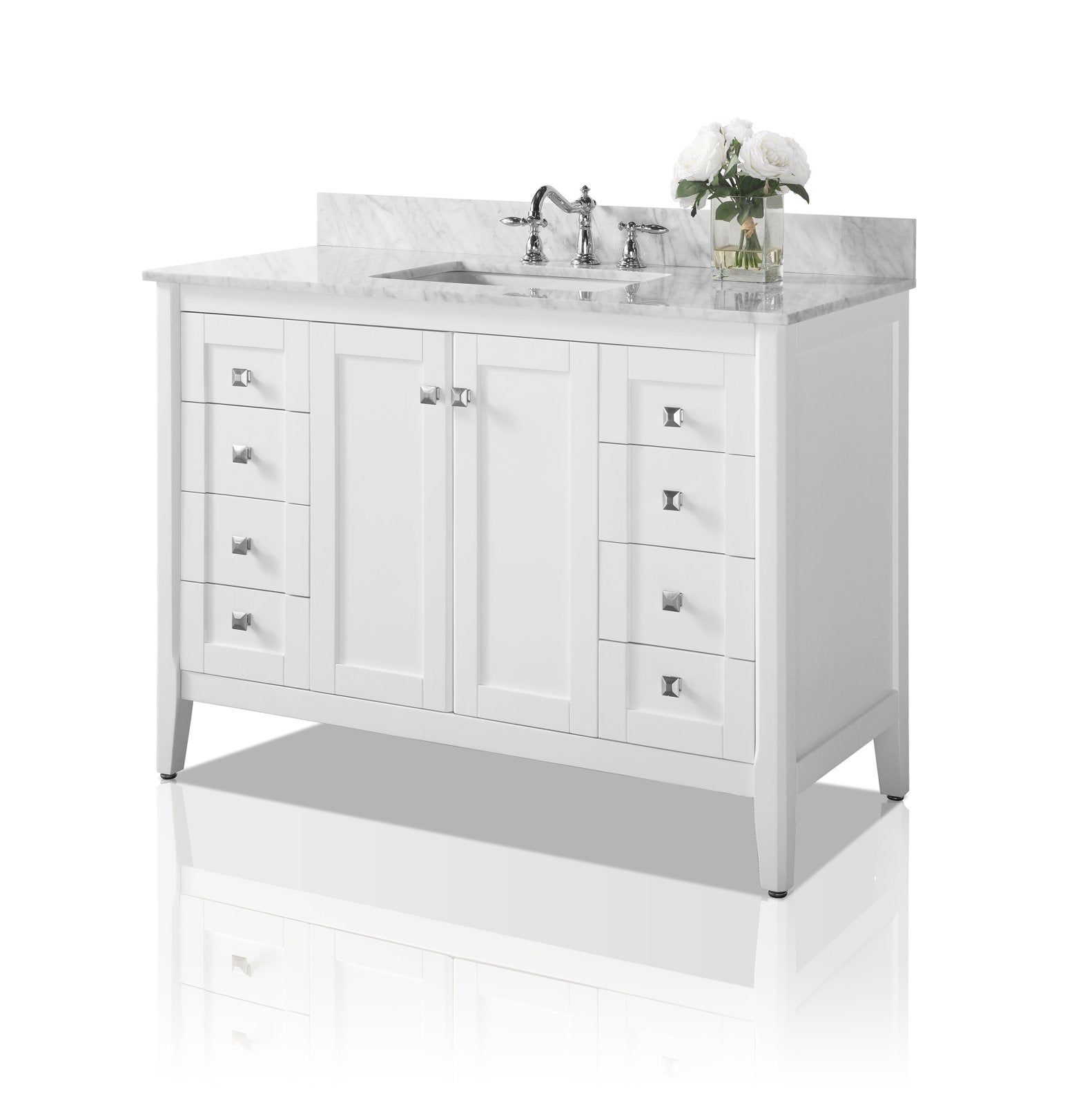 48-inch freestanding single-sink bathroom vanity in white solid wood with a marble stone top and backsplash, undermount ceramic sink, chrome faucet and square chrome knobs, center cabinet flanked by stacked drawers and a vase of white roses.