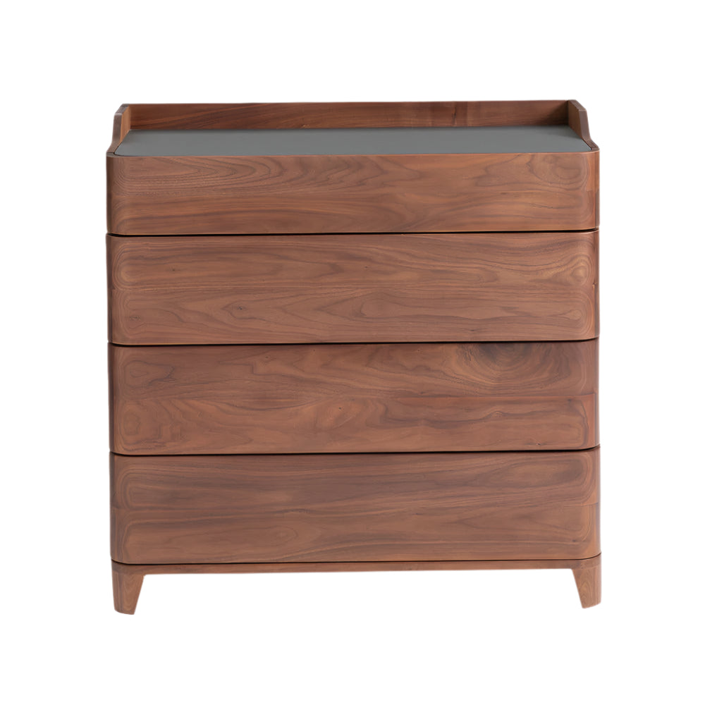 Walnut armoire dresser with four handleless drawers, a black linoleum top with raised back edge, tapered legs and smooth rounded corners in a modern contemporary style.