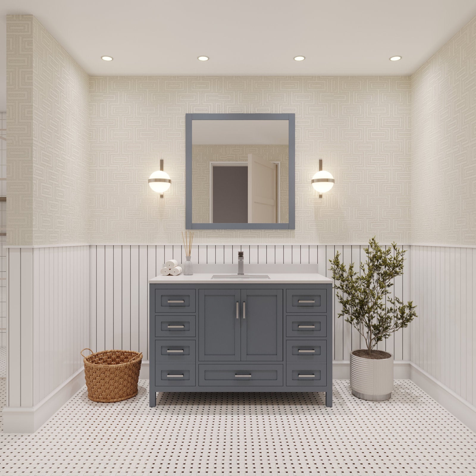 48-inch single-sink solid wood vanity with a stone countertop in stone-gray finish, matching framed mirror, two globe wall sconces, woven basket and potted plant in a bright modern bathroom setting.