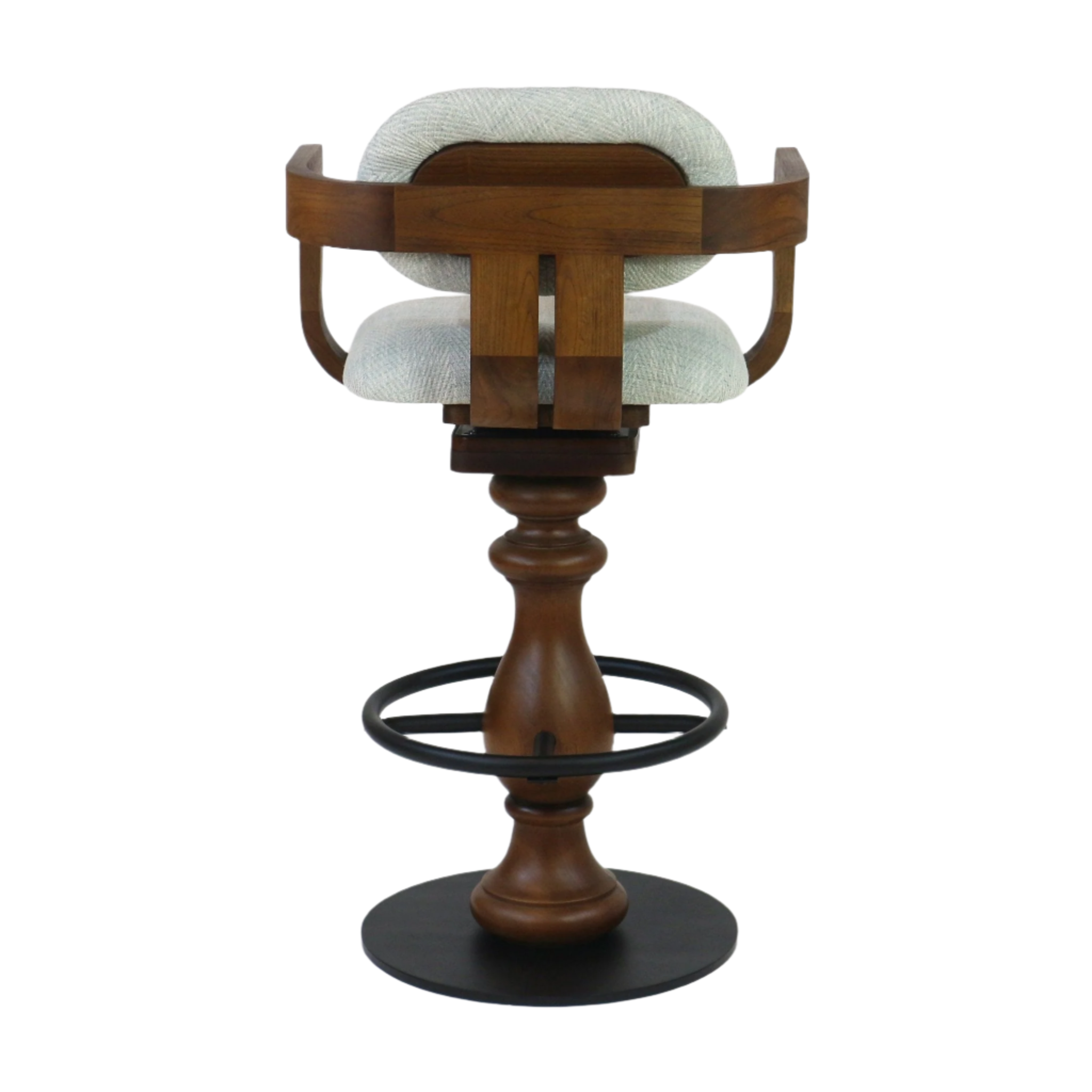 Contemporary swivel bar stool with light gray fabric seat and back, natural walnut-toned wooden curved frame and turned pedestal base, finished with a black metal circular footrest.