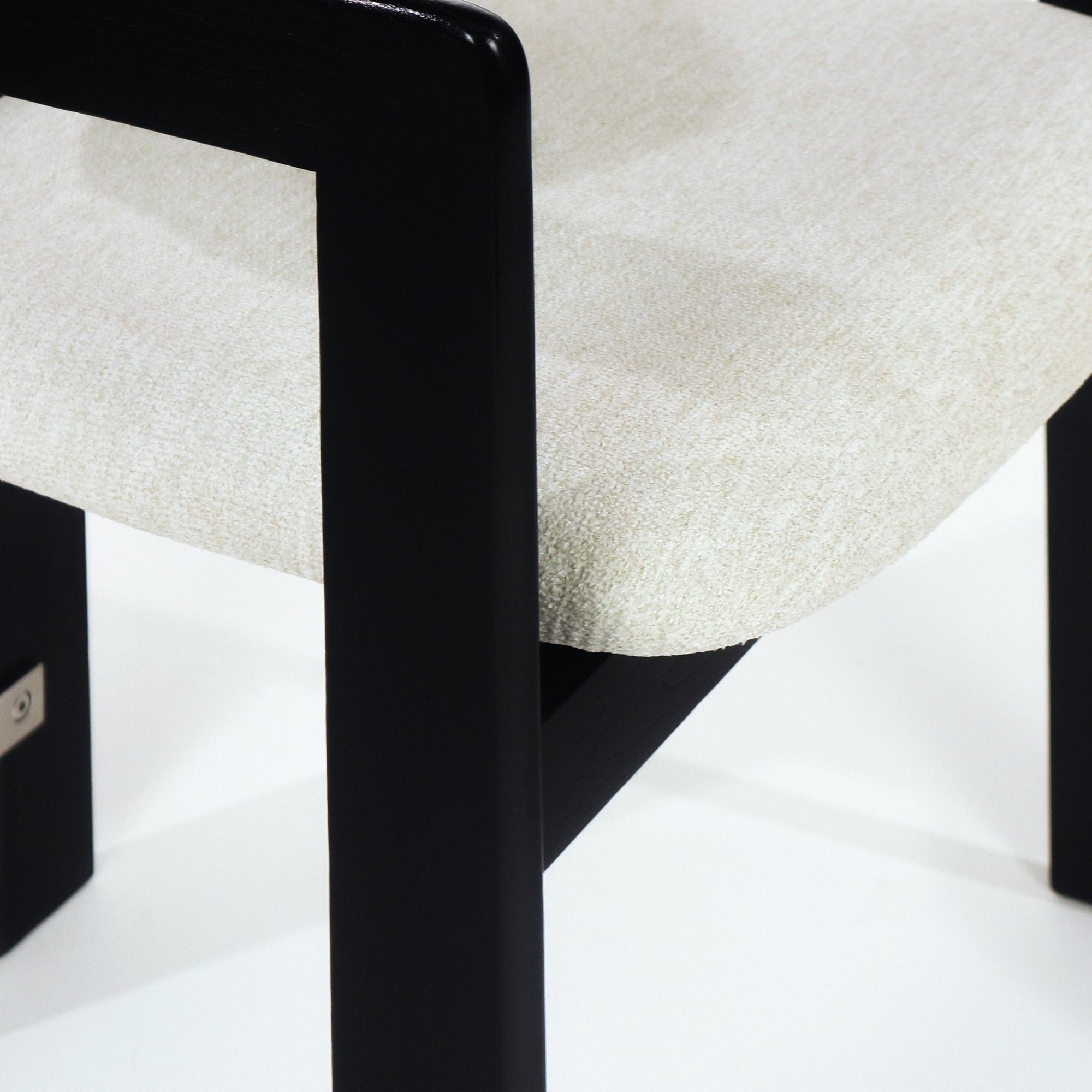 Black Pamplona Dining Chair with Beige Boucle and Stainless Steel Accents - INTERIORTONIC