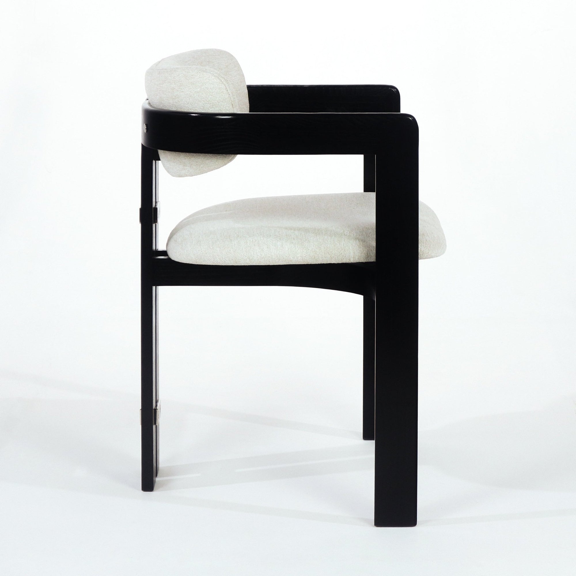 Black Pamplona Dining Chair with Beige Boucle and Stainless Steel Accents - INTERIORTONIC