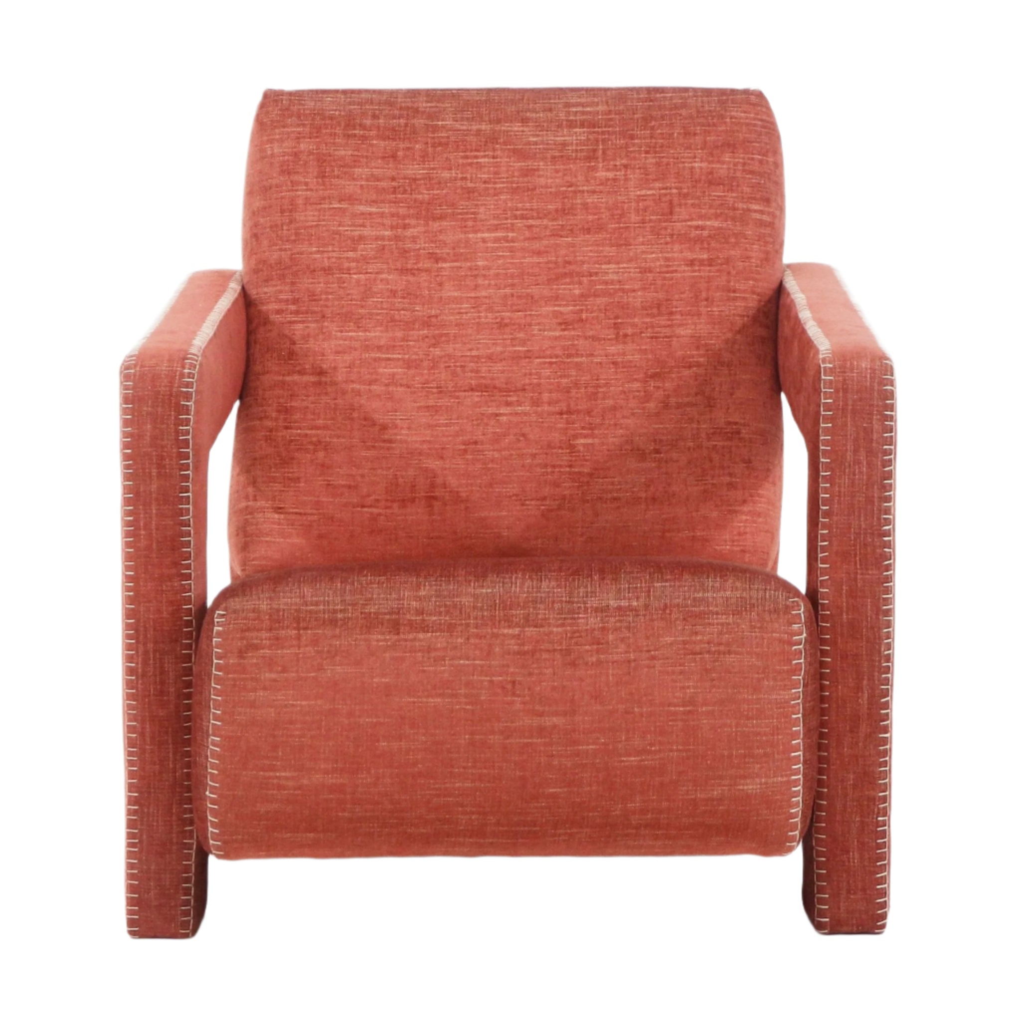 Front view of a modern terracotta upholstered lounge chair in woven fabric, with a full back, squared arms and visible white contrast stitching along the arm edges.