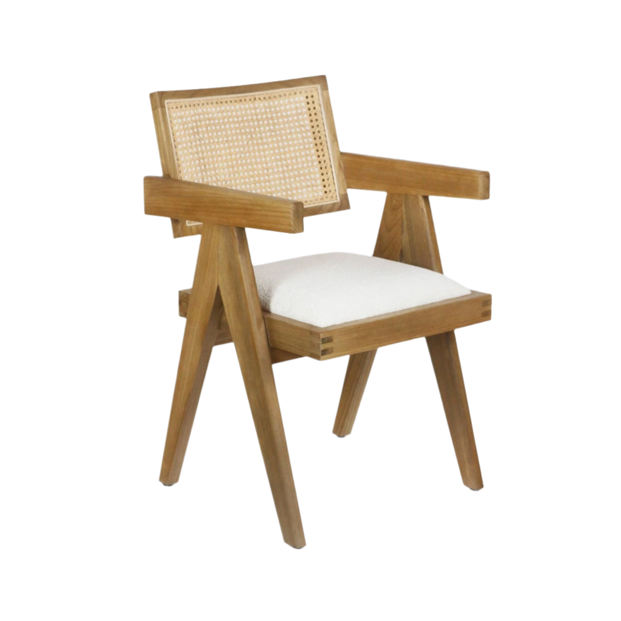 Mid-century modern natural wood dining armchair with a woven cane back, angled legs, straight wooden arms and a white upholstered bouclé seat cushion.