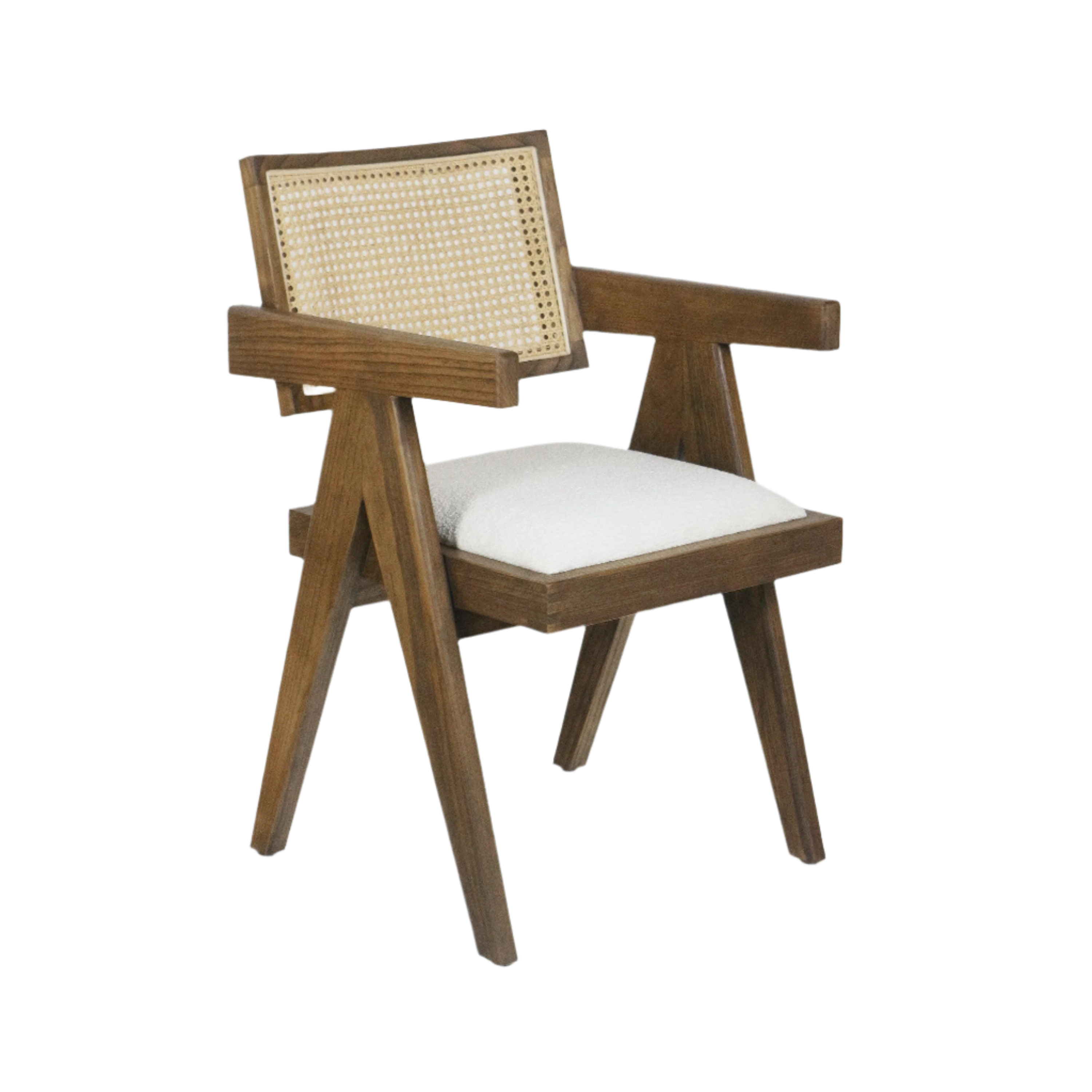 Natural wood dining chair with angled mid-century frame, woven cane backrest, rectangular wooden armrests, and a cushioned white upholstered seat.