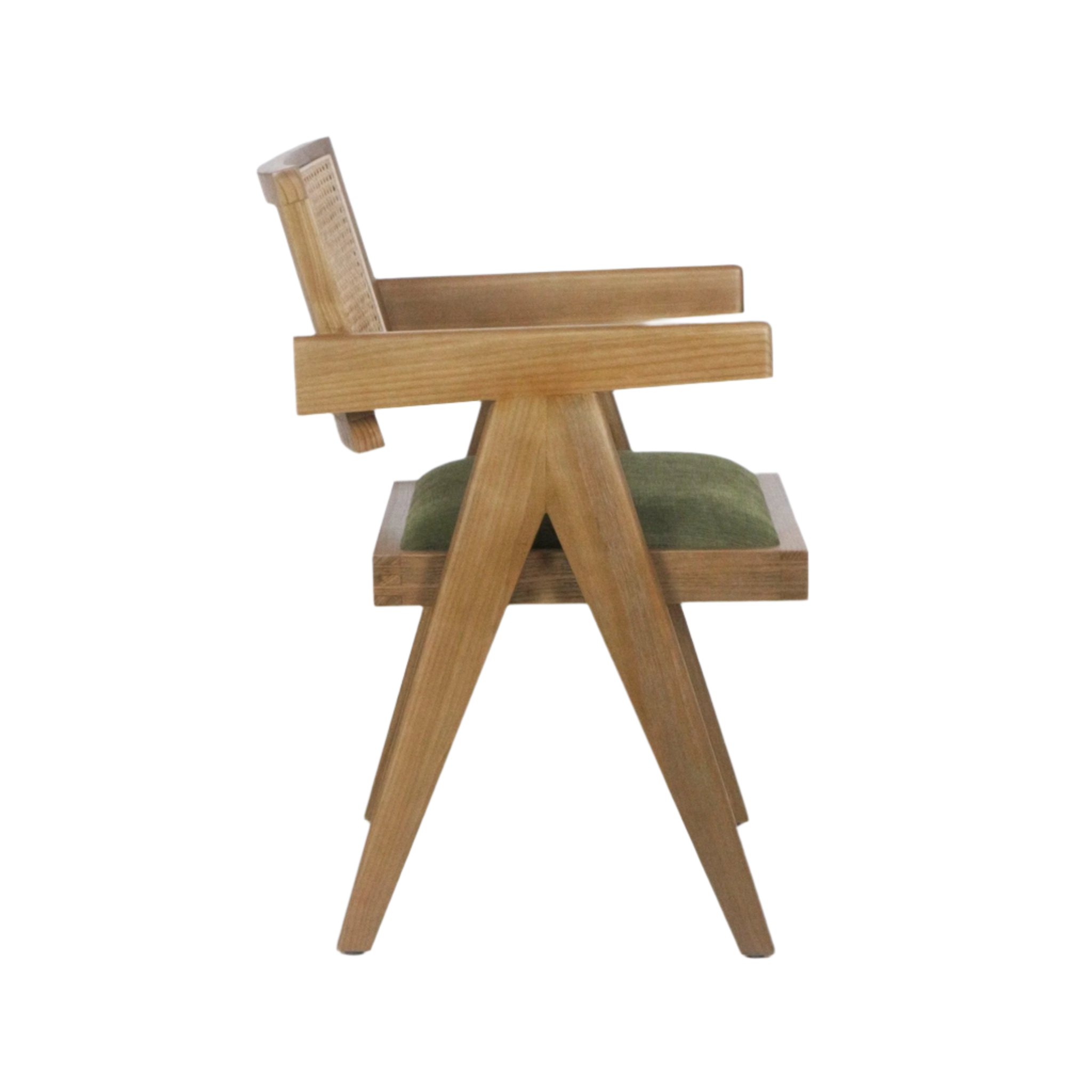 Side view of a natural wood dining chair with a woven cane back, solid wood A-frame legs and armrests, and a green upholstered seat cushion on a white background.
