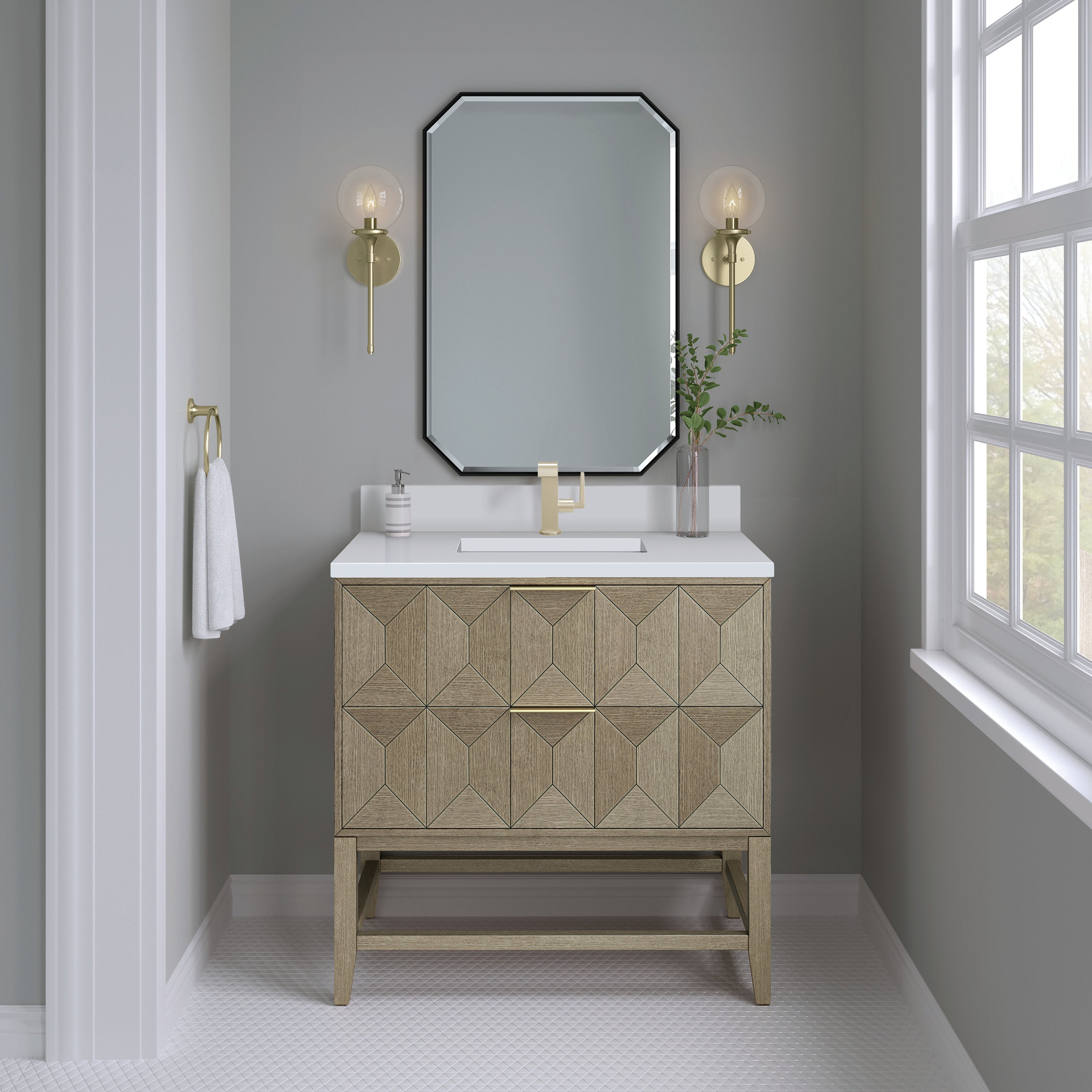 36-inch freestanding solid wood bathroom vanity in natural wood with a white quartz stone top, rectangular undermount sink, single-hole brass faucet, geometric carved drawer front, brass sconces and beveled octagonal mirror.