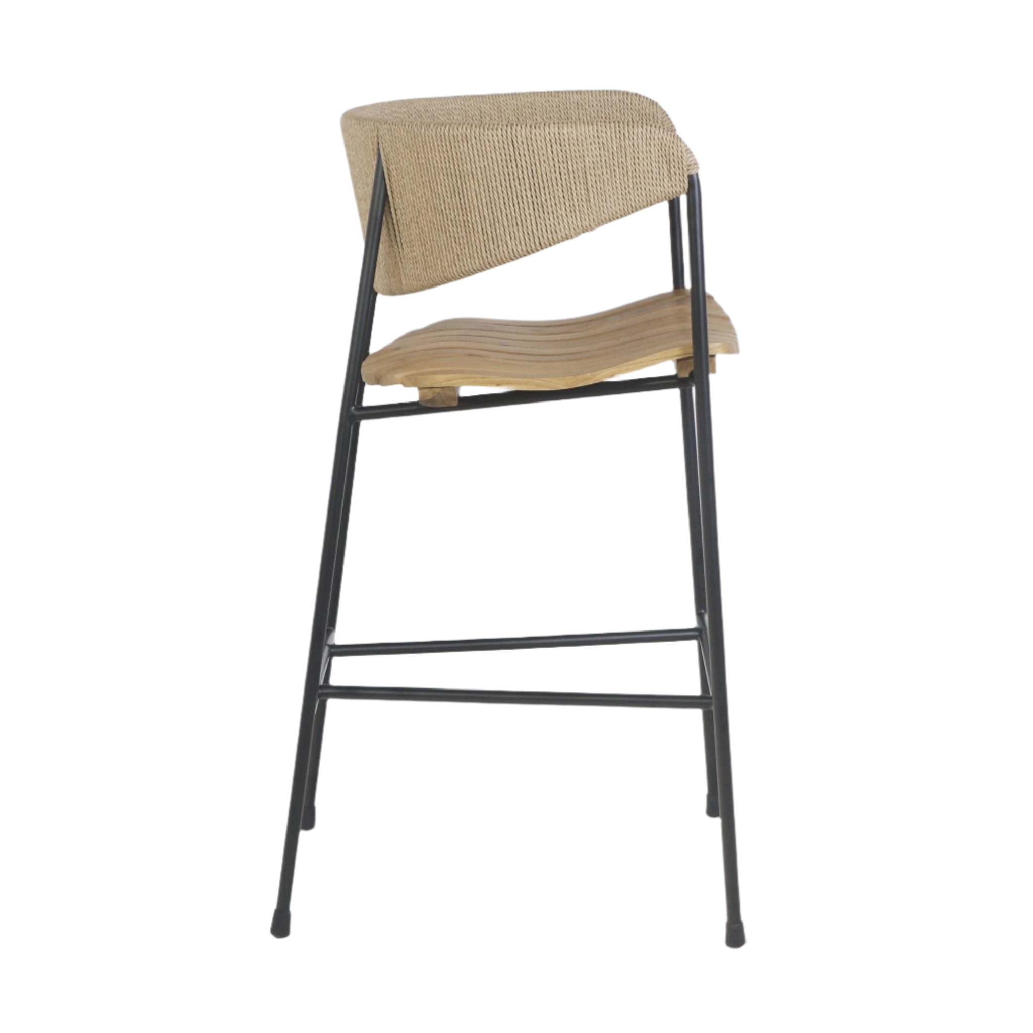 Side view of a coastal-style bar stool with a sculpted teak seat, natural rush-woven backrest and slim black steel frame with integrated footrest.