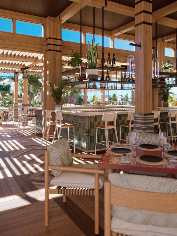 Oak-framed Danish dining chair with papercord seat and neutral beige cushions pictured in a sunlit Scandinavian-style dining and bar setting with wood beams, matching stools, plants, and warm natural finishes.