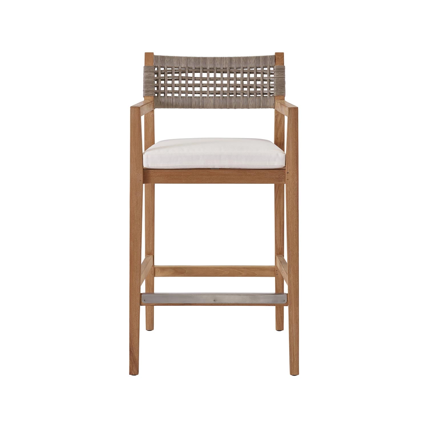 Coastal teak outdoor bar stool with a natural teak solid-wood frame, neutral woven rope back, white fabric upholstered seat cushion, armrests and a metal-reinforced footrest.