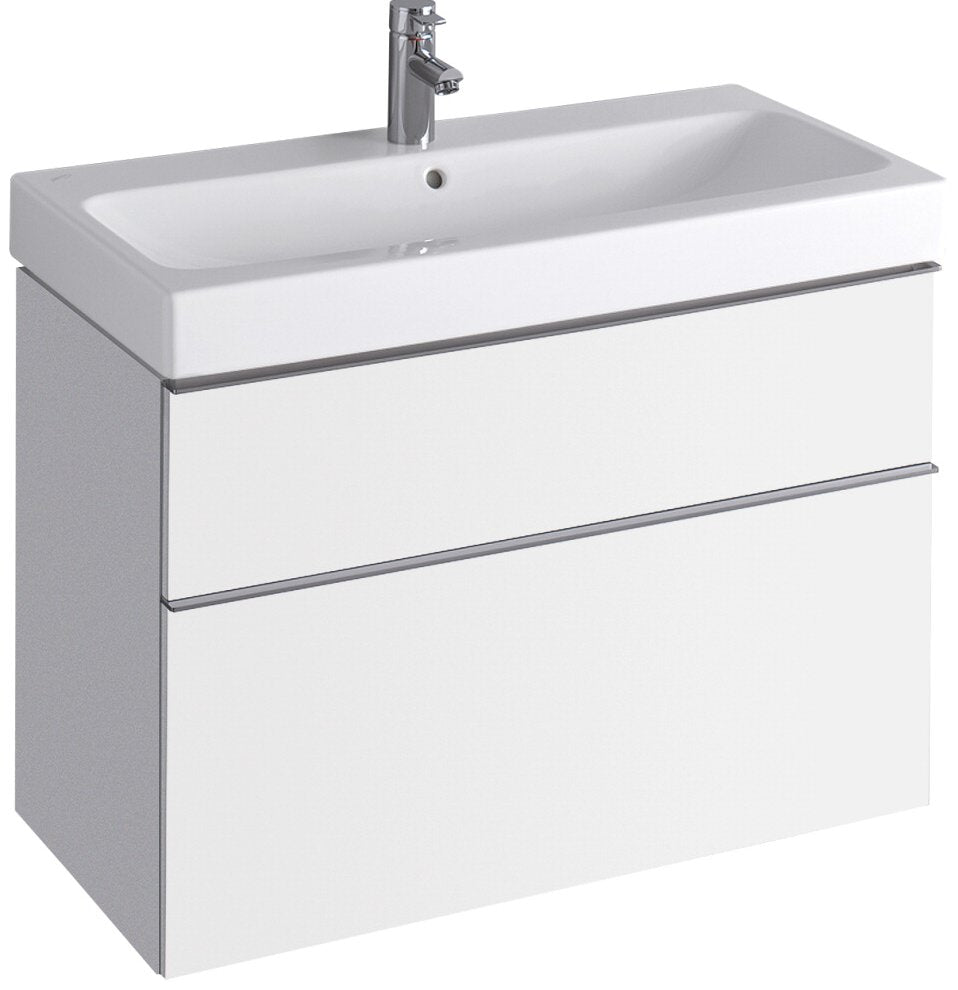 Wall-mounted modern bathroom vanity with a white ceramic integrated sink, chrome single-handle faucet and two stone-finish wooden drawers with slim chrome trim.
