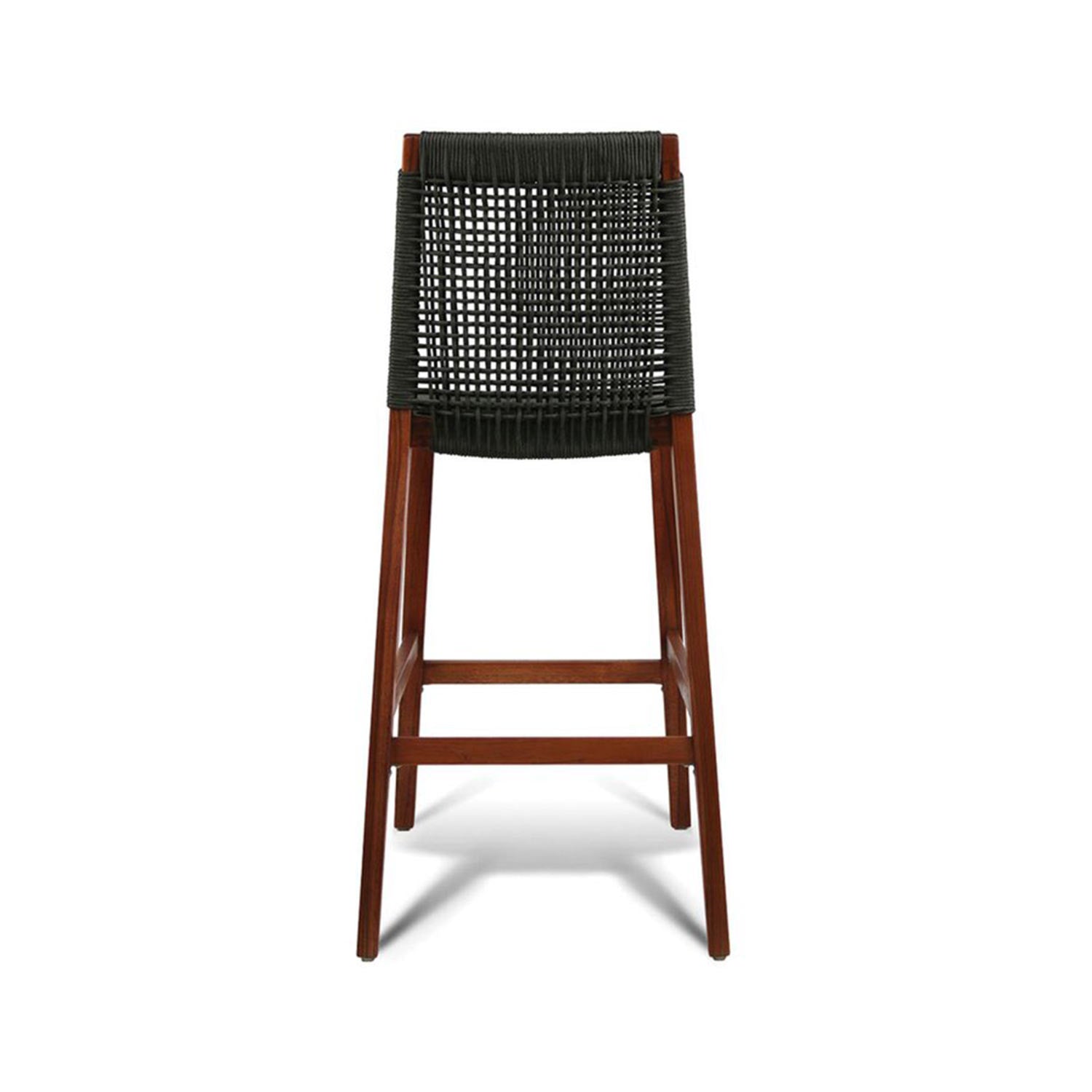 Rear view of an armless outdoor bar stool with dark woven rope back and solid teak wood frame, tapered legs and integrated footrest, shown against a white background.