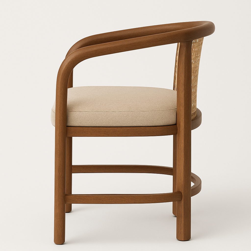 Side view of an outdoor dining chair with a warm teak frame, curved arm, woven rattan back and a round beige fabric seat cushion.