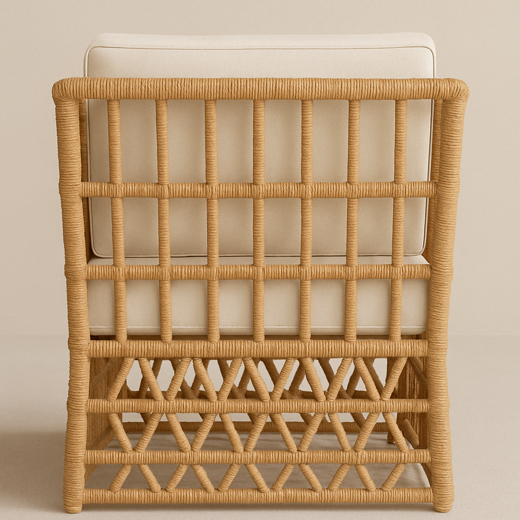 Rear view of a rust-toned handwoven synthetic wicker outdoor accent chair with cream upholstered cushions, a square-grid back and geometric woven base over an aluminum frame.